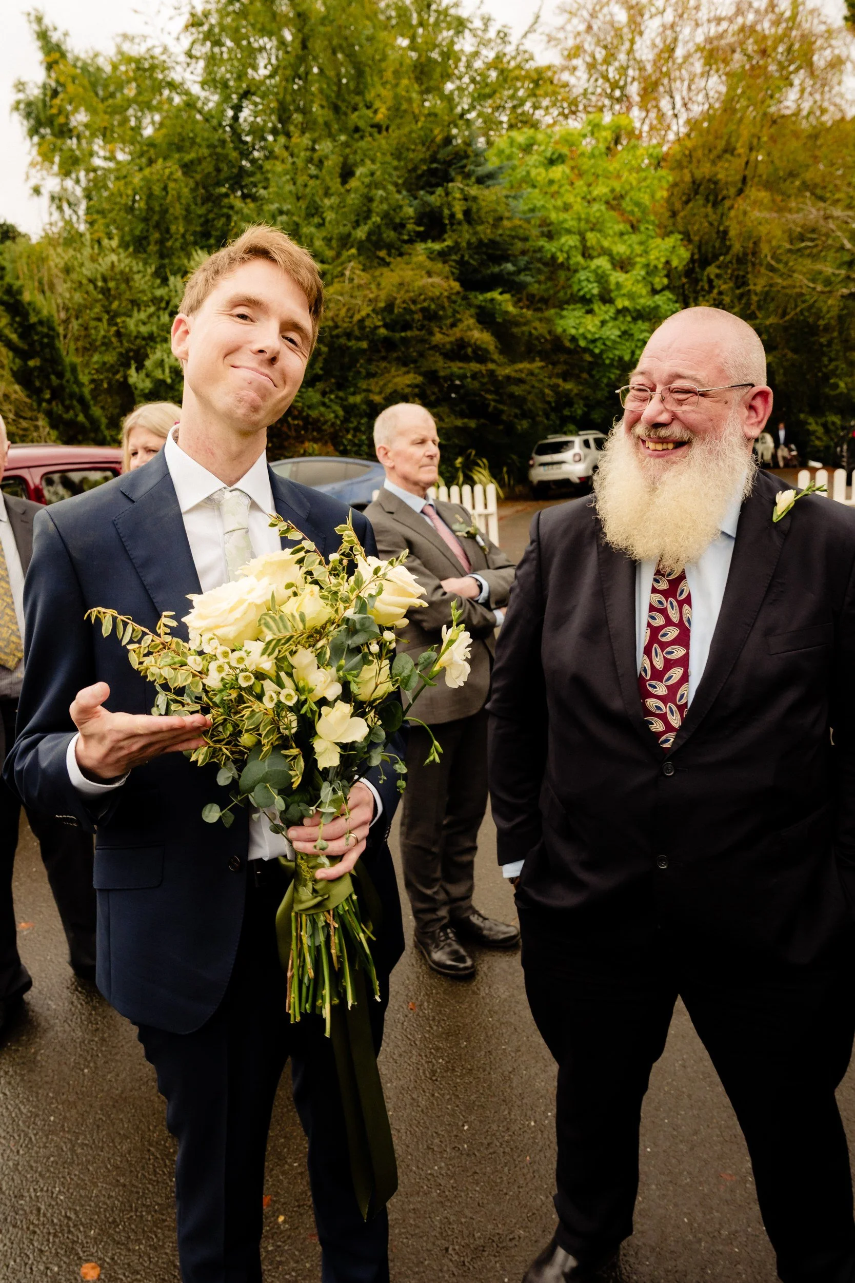 tinakilly-wedding-photographer-laura-james-42-james-holding-the-bouquet.jpg