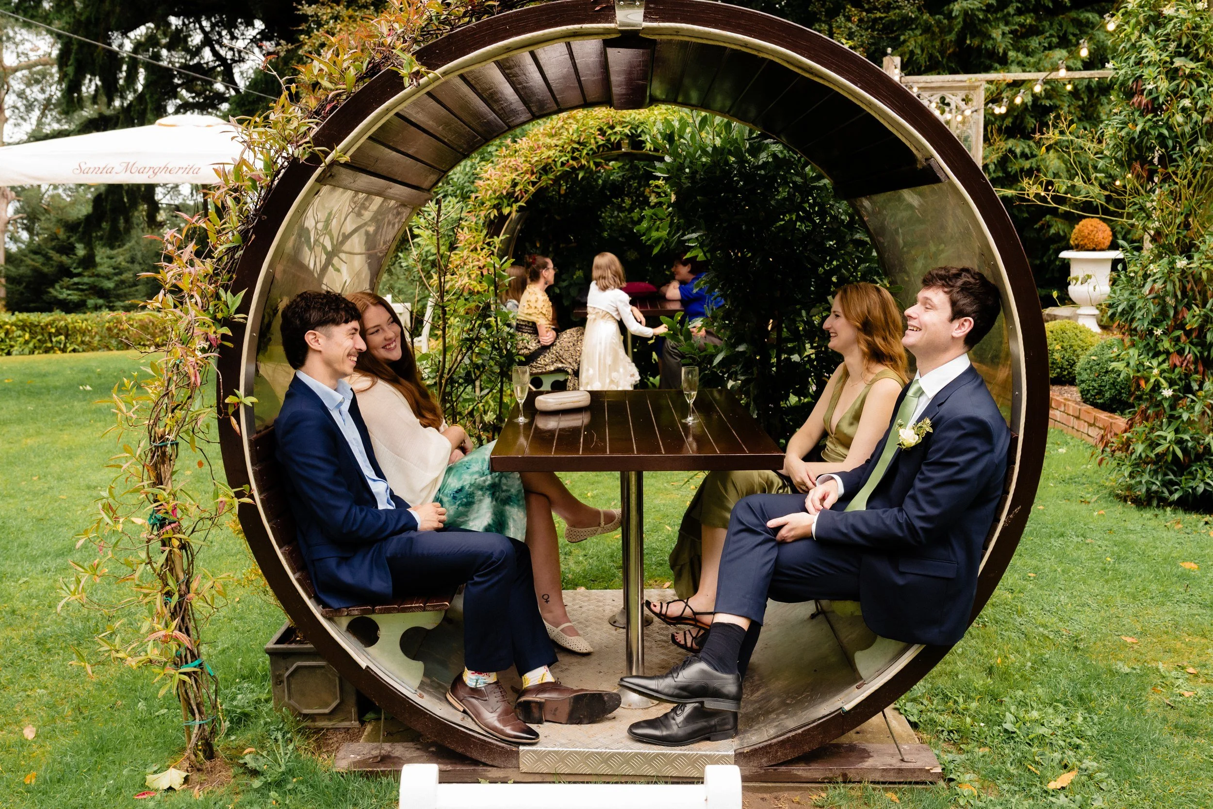 tinakilly-wedding-photographer-laura-james-45-guests-in-the-round-garden-seat.jpg