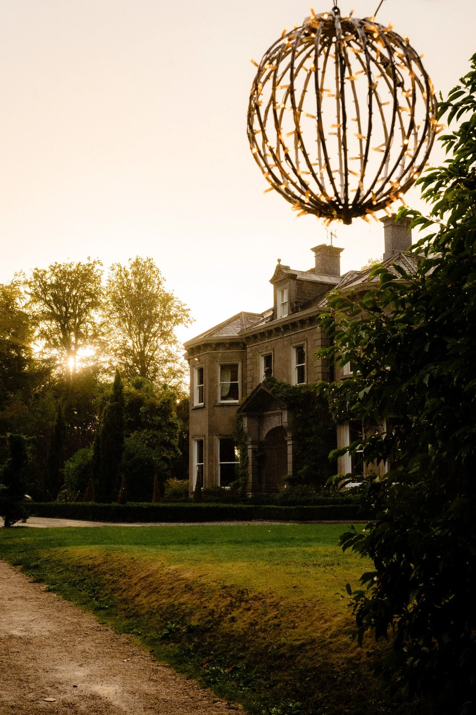 tinakilly-wedding-photographer-laura-james-61-lantern-at-dusk.jpg
