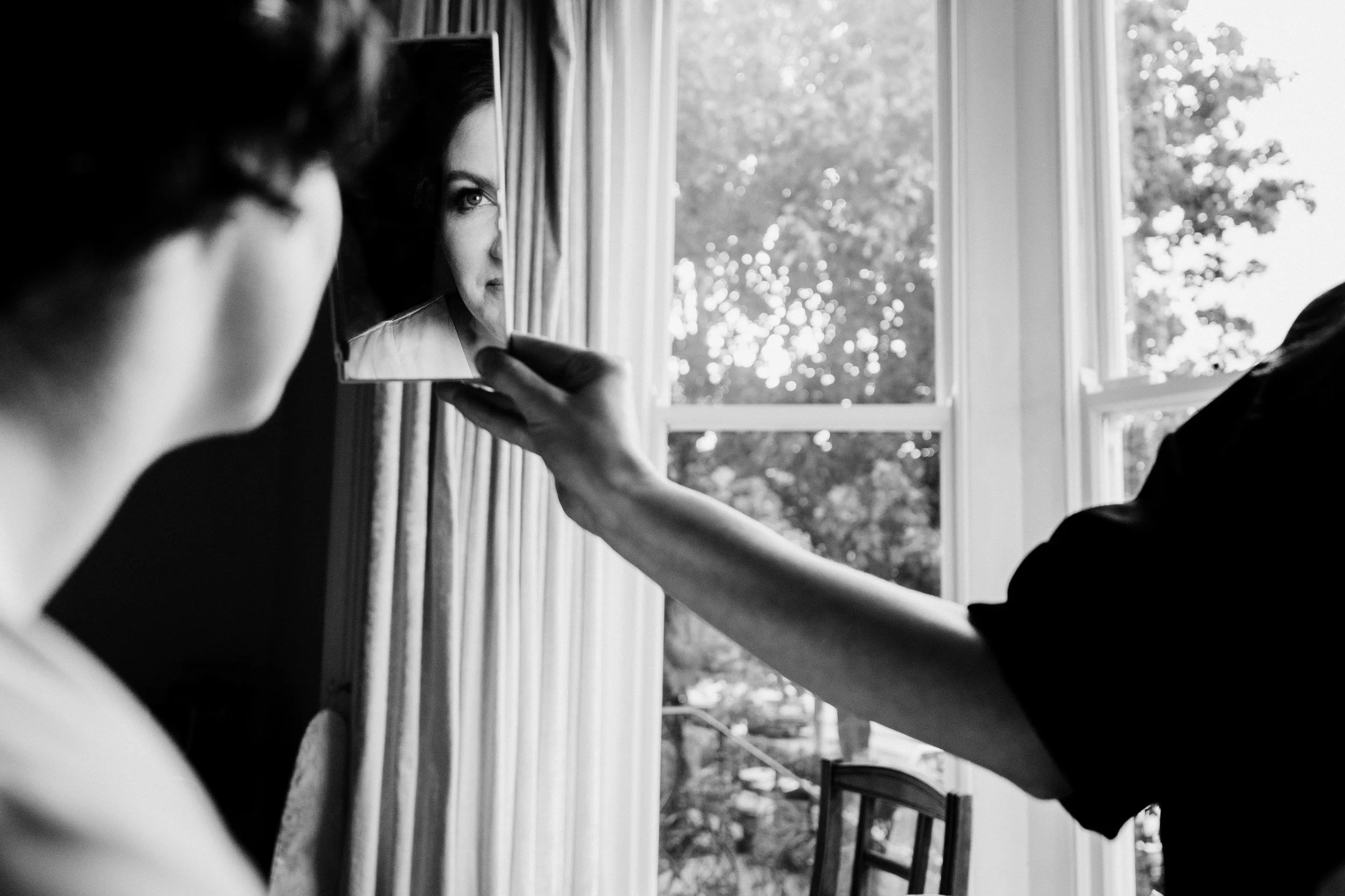 rathsallagh-wedding-photographer-niamh-john-06-make-up-mirror-window.jpg