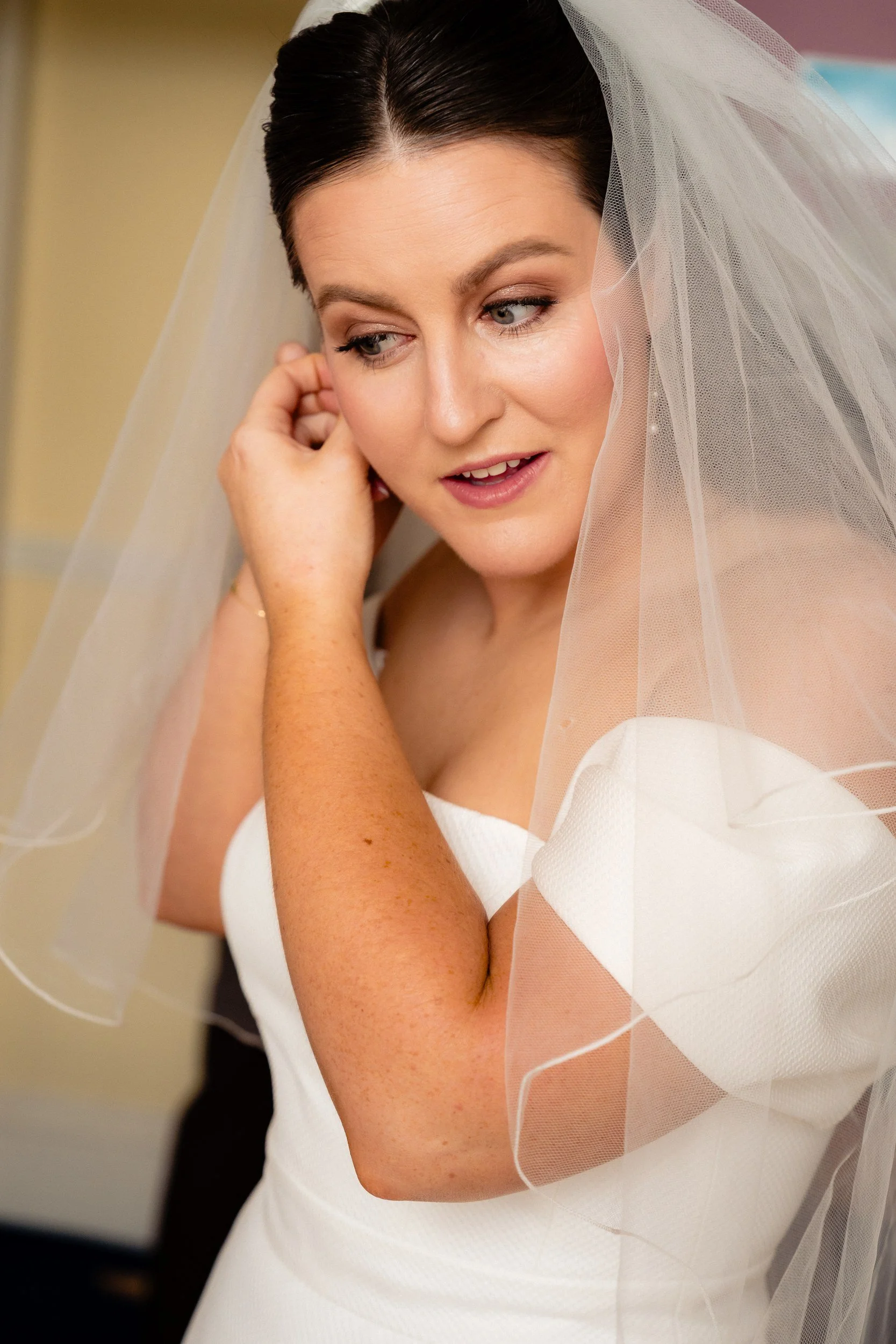 rathsallagh-wedding-photographer-niamh-john-19-bride-earring-veil.jpg