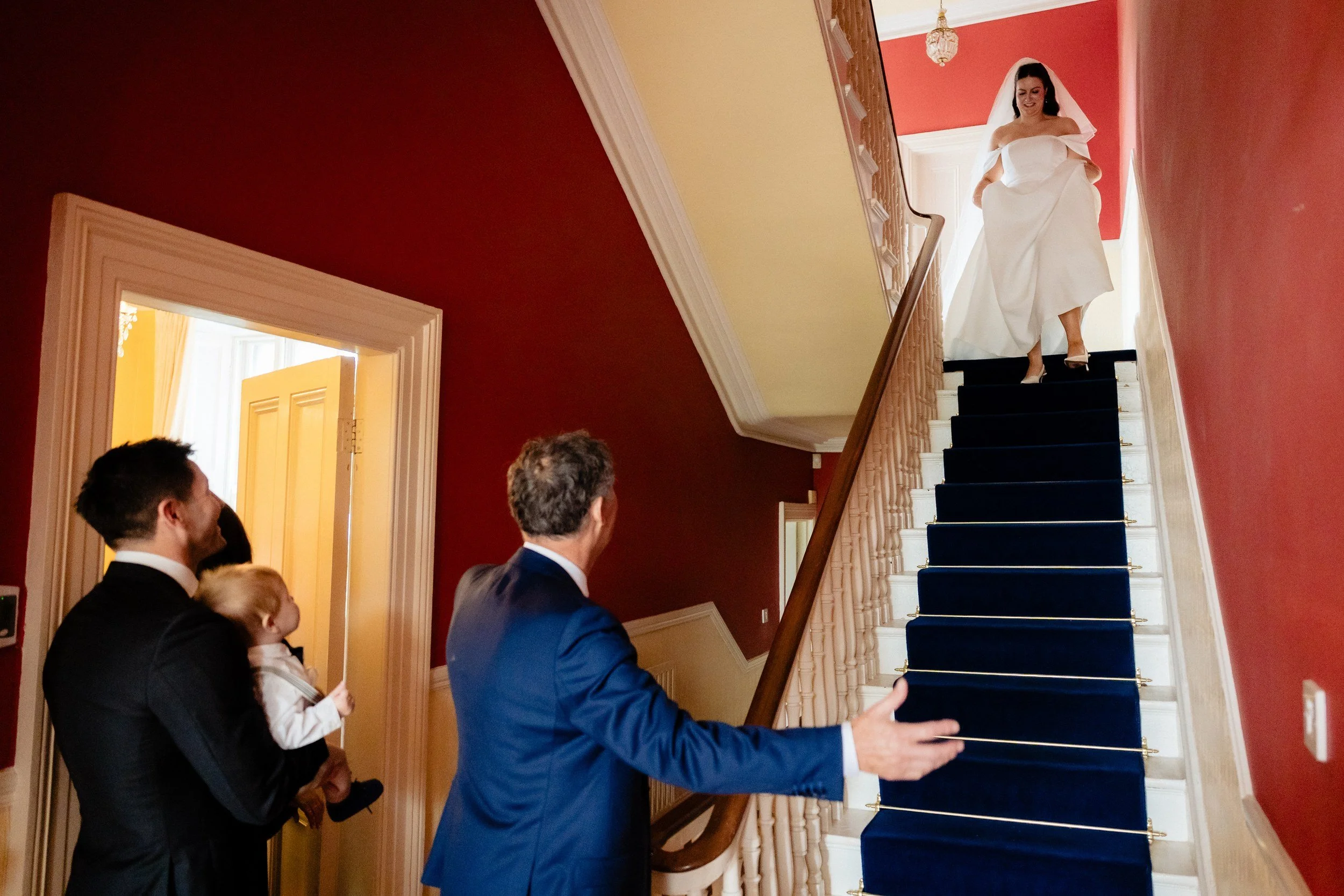 rathsallagh-wedding-photographer-niamh-john-20-father-waiting-stairs.jpg