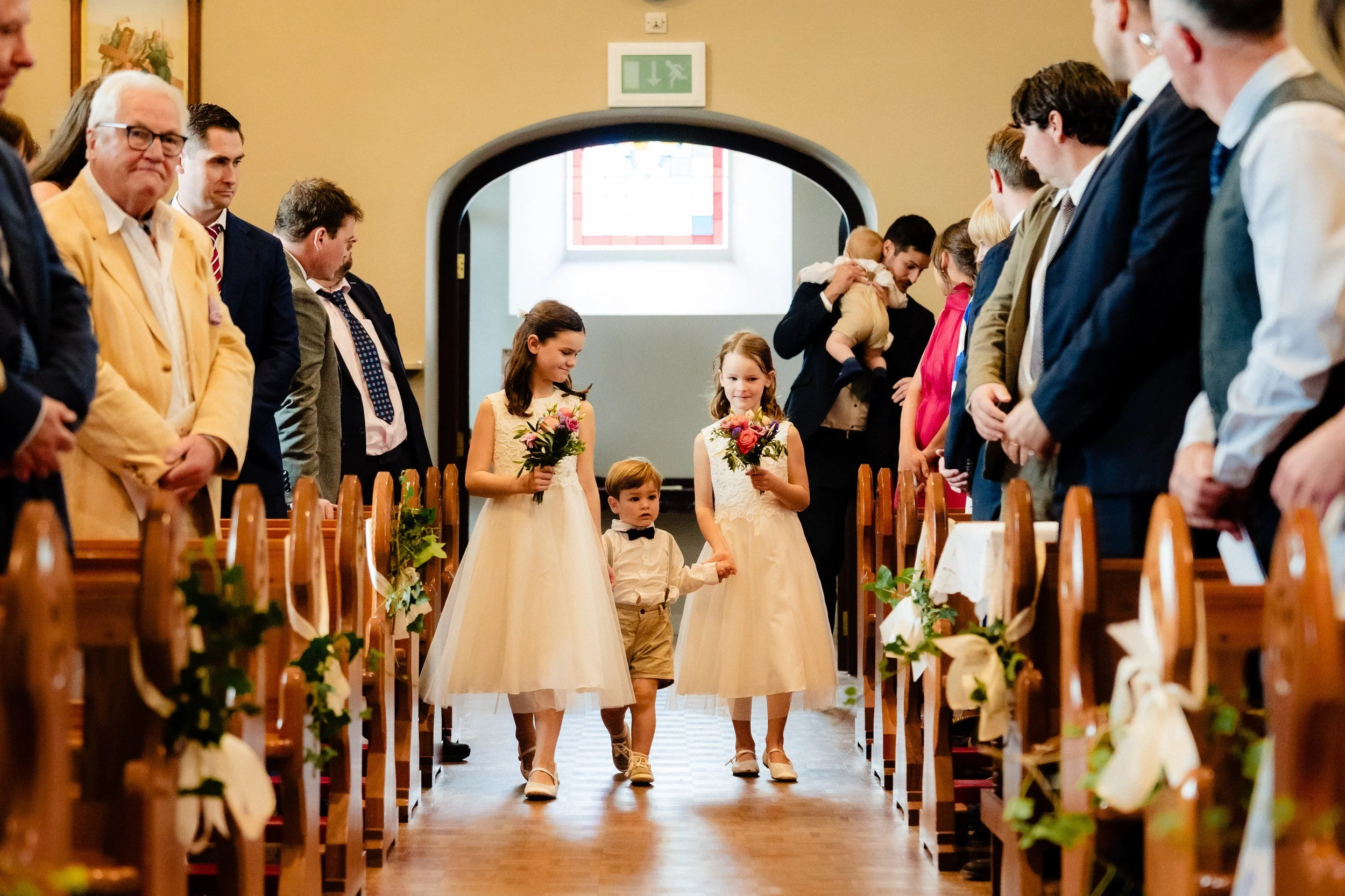 rathsallagh-wedding-photographer-niamh-john-37-flower-girls-aisle.jpg