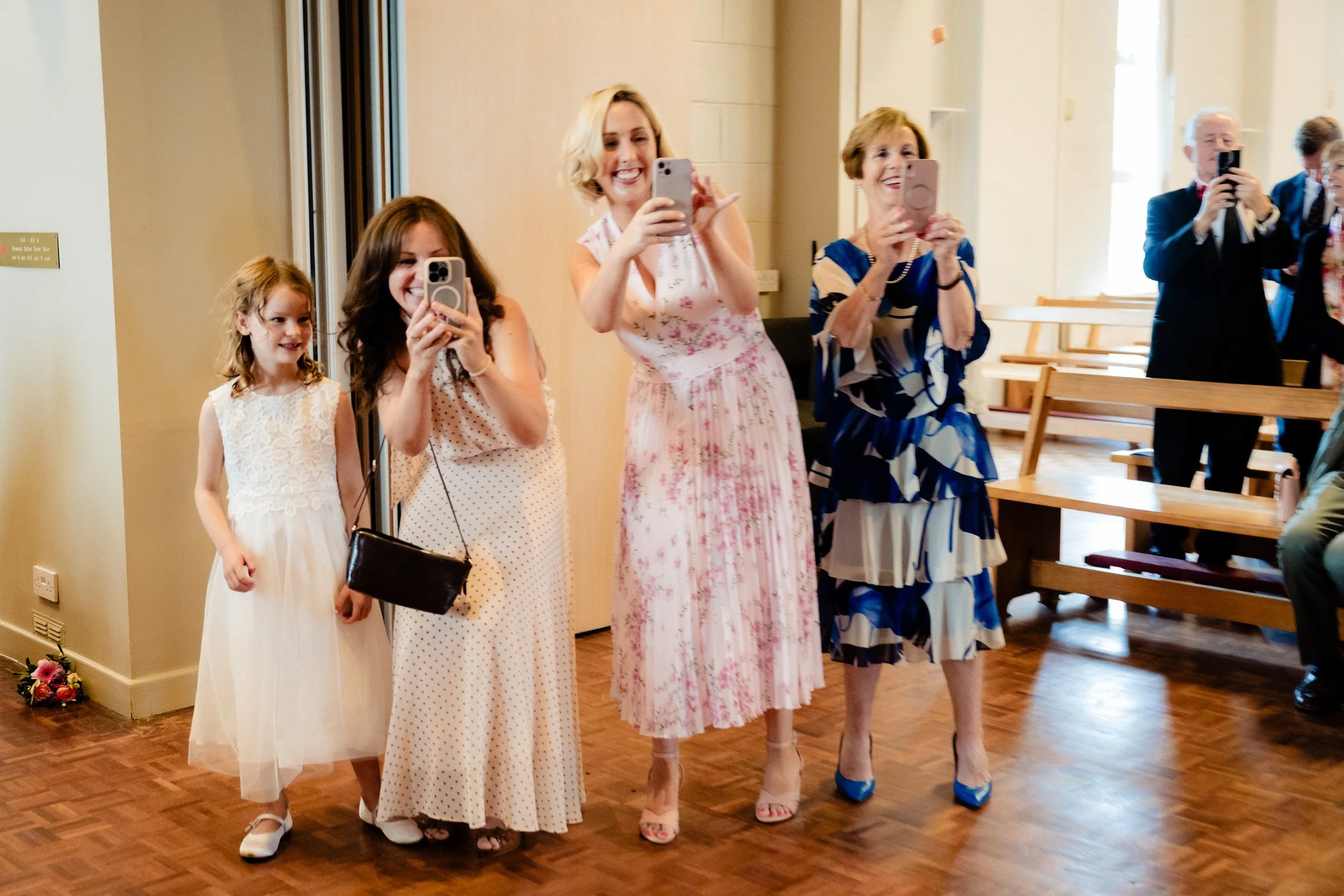 rathsallagh-wedding-photographer-niamh-john-49-guests-filming-signing.jpg