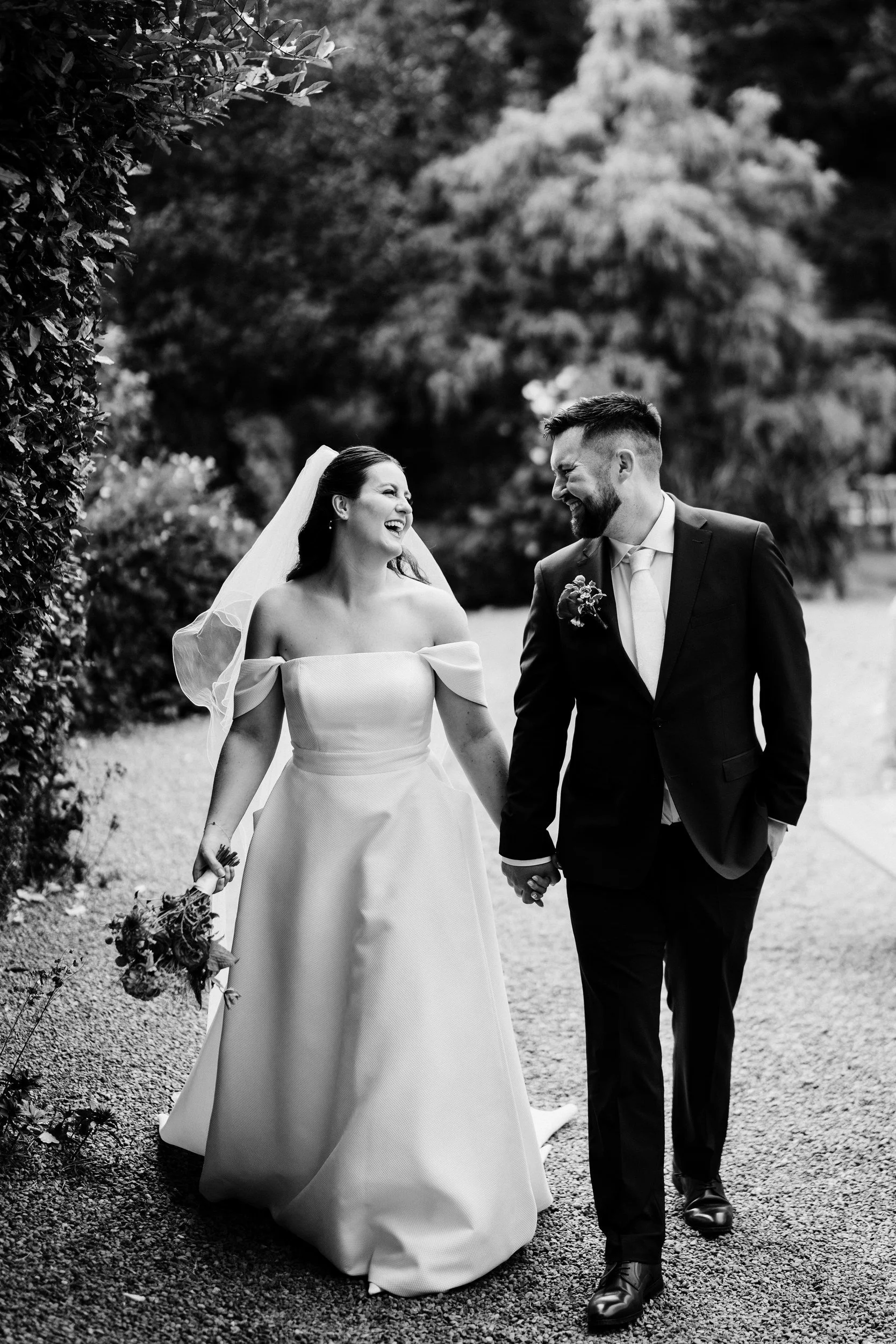 rathsallagh-wedding-photographer-niamh-john-55-couple-walking-garden.jpg