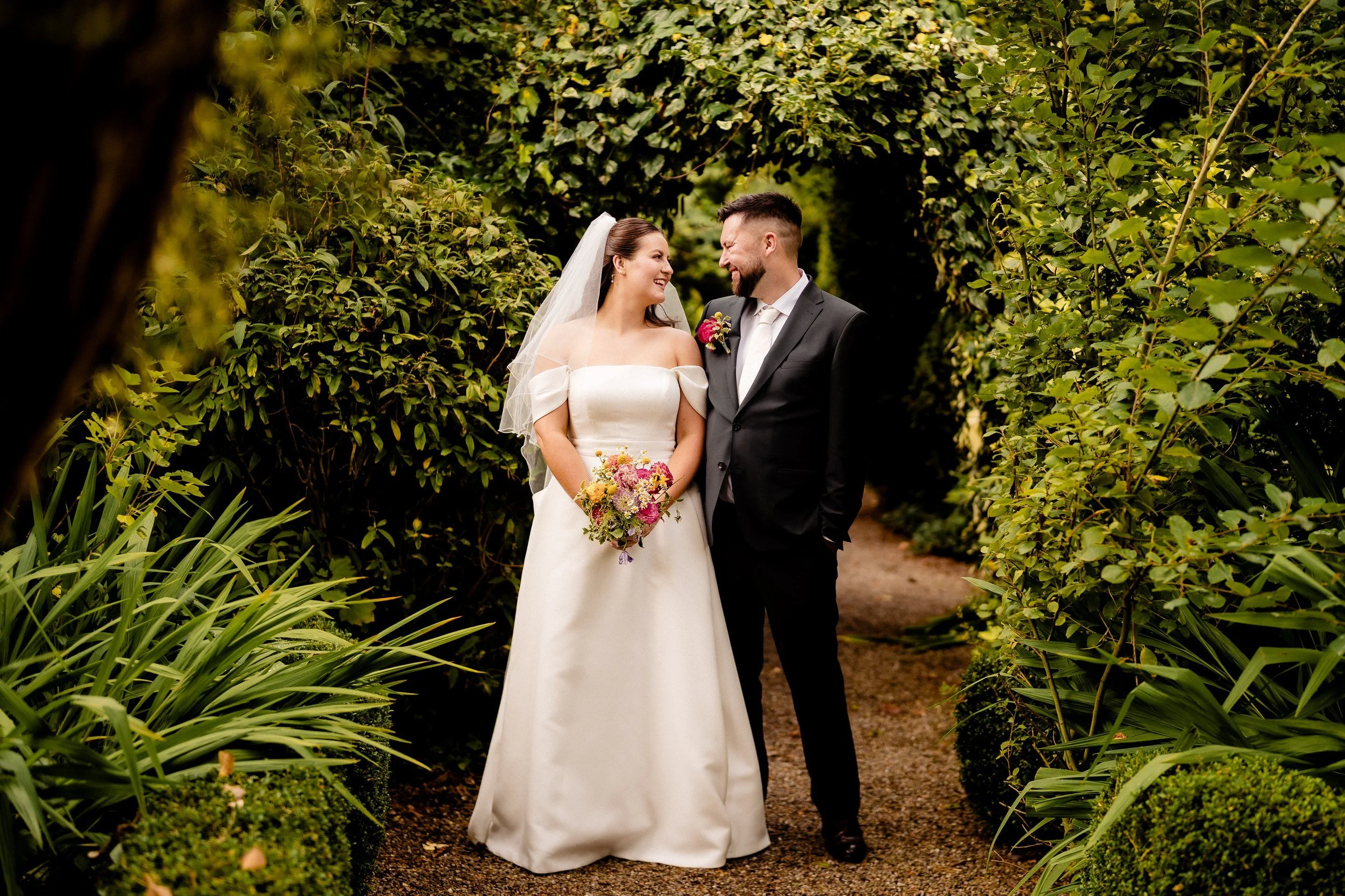 rathsallagh-wedding-photographer-niamh-john-56-couple-ivy-arch.jpg