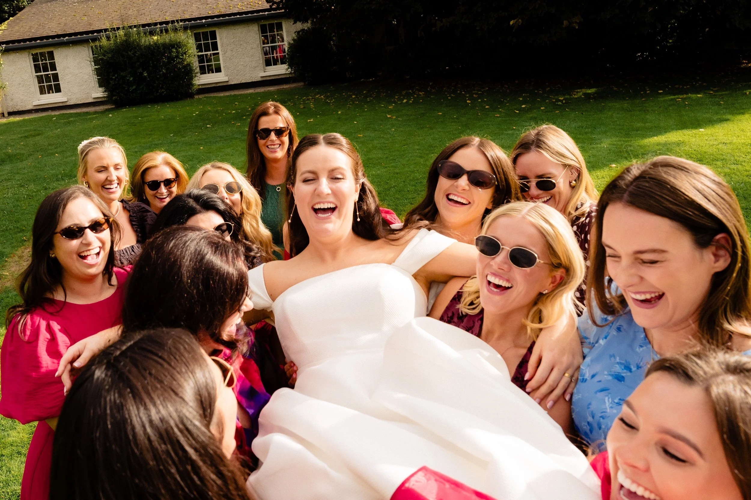 rathsallagh-wedding-photographer-niamh-john-70-friends-lift-bride.jpg