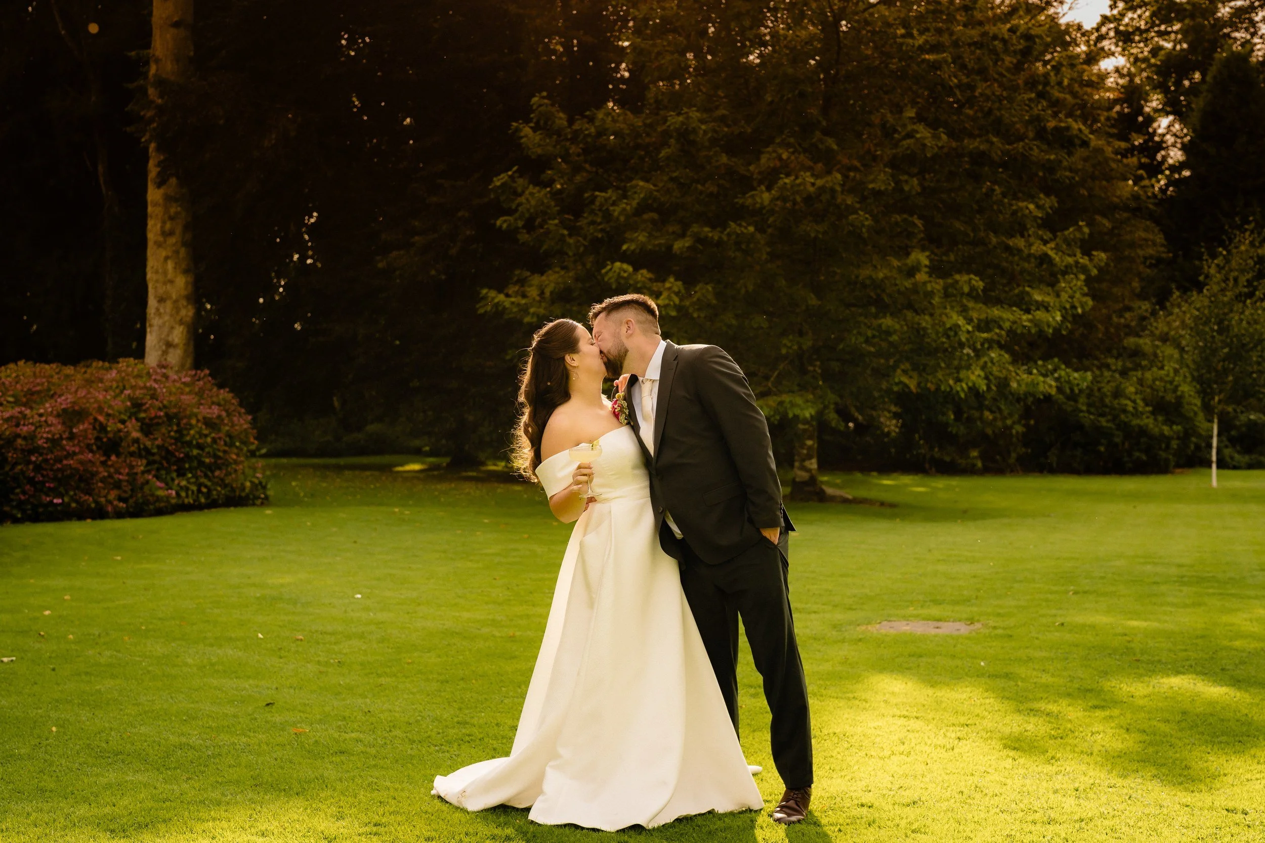 rathsallagh-wedding-photographer-niamh-john-71-kiss-under-big-tree.jpg