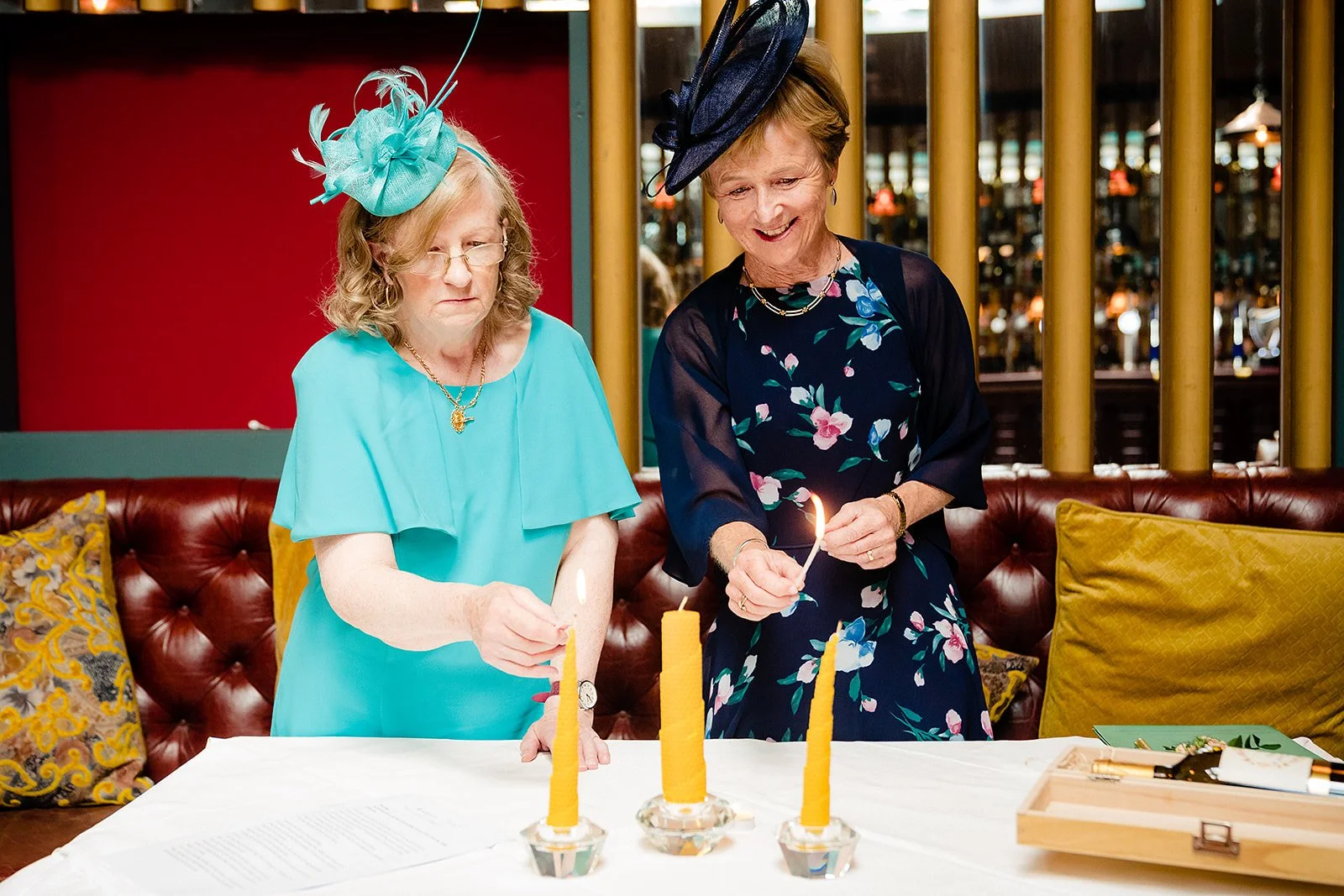 marco-pierre-white-wedding-photographer-elle-iain-34-the-two-mums-lighting-the-candles.jpg