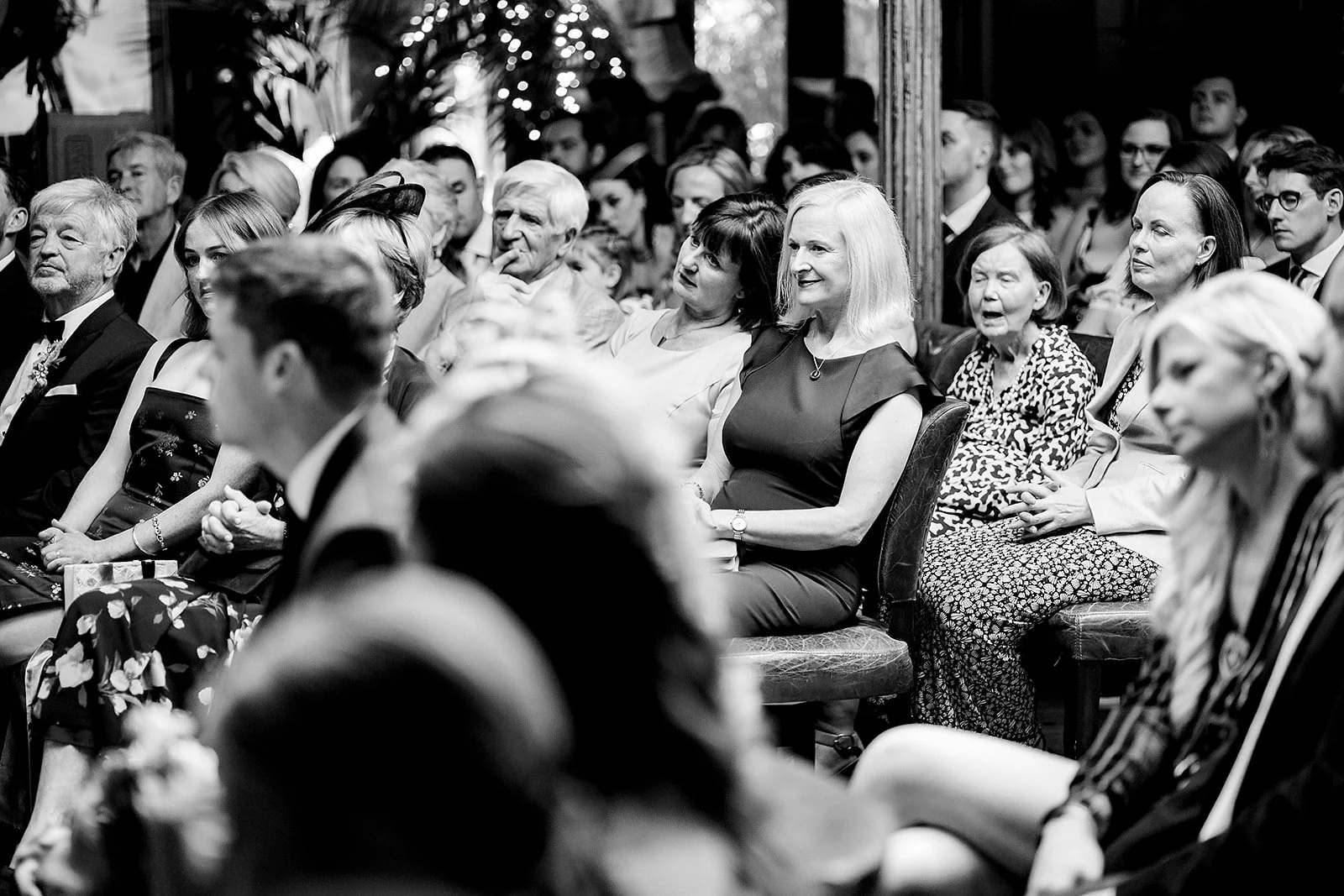 marco-pierre-white-wedding-photographer-elle-iain-35-guests-laughing-during-the-ceremony.jpg
