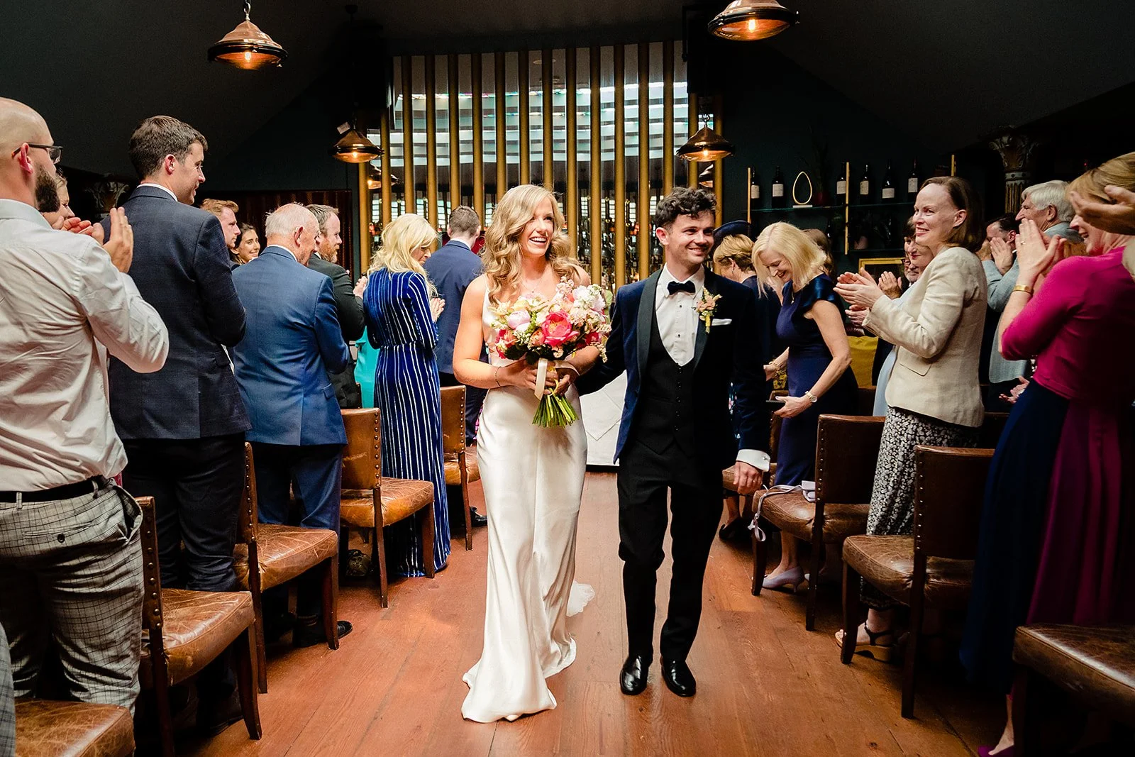 marco-pierre-white-wedding-photographer-elle-iain-41-elle-and-iain-walking-back-down-the-aisle.jpg