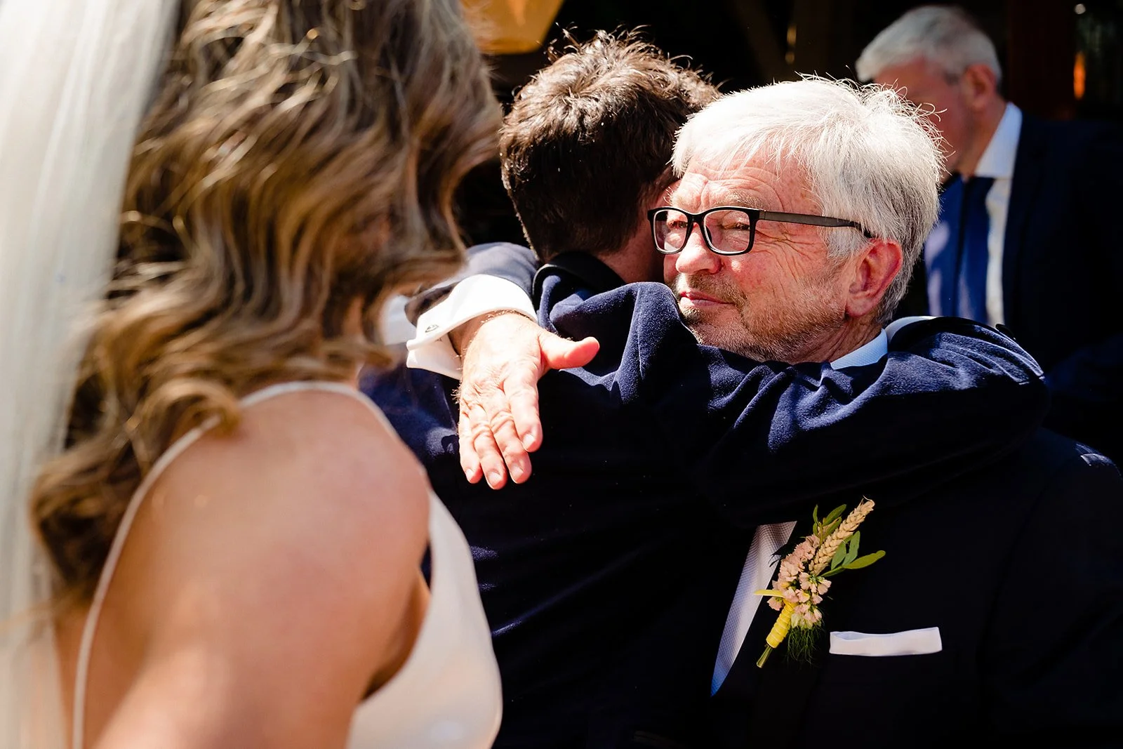 marco-pierre-white-wedding-photographer-elle-iain-45-iain-hugging-an-older-guest.jpg