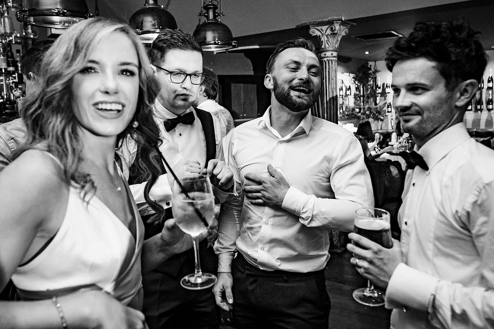 marco-pierre-white-wedding-photographer-elle-iain-78-friends-laughing-with-elle-on-the-dance-floor.jpg