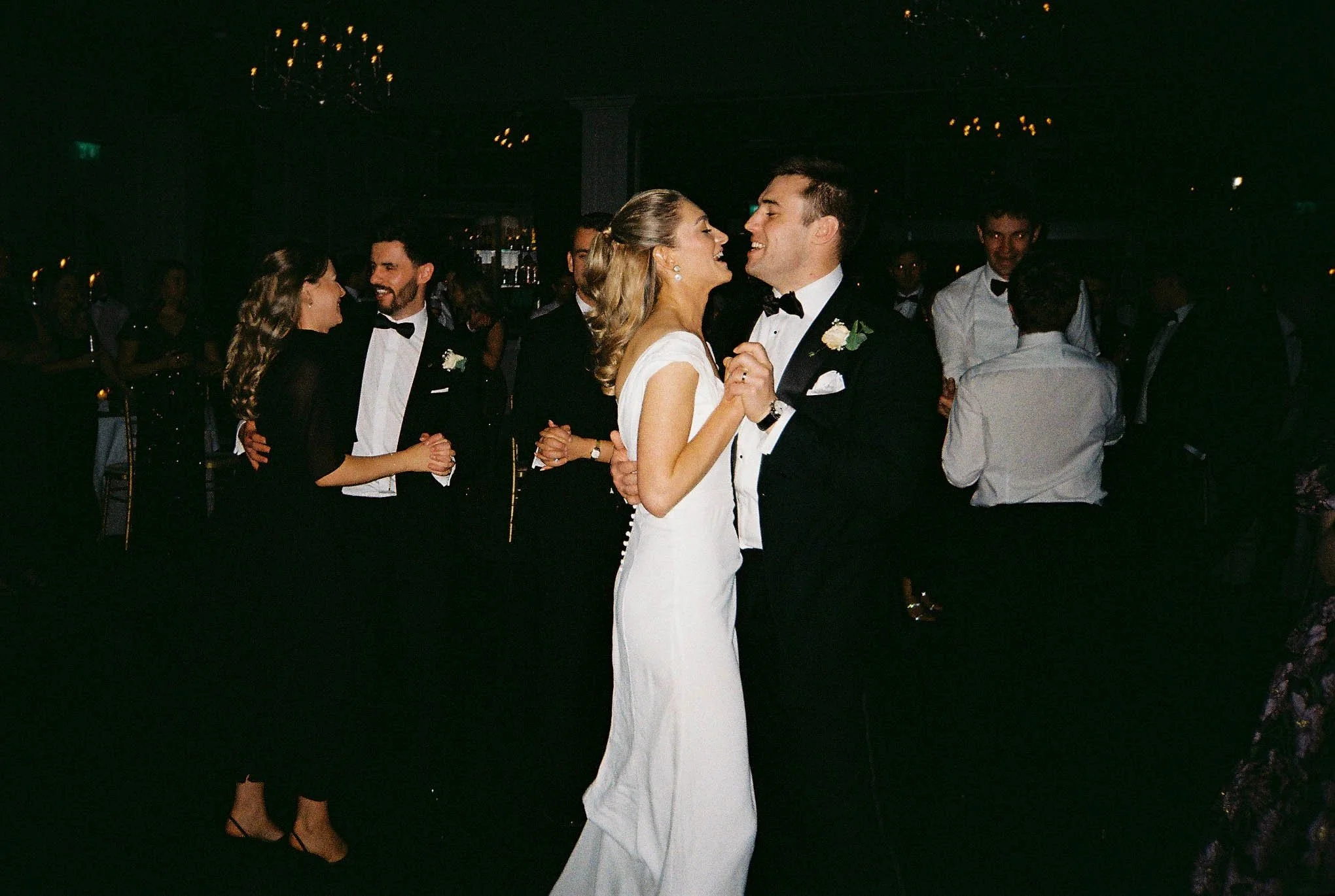 analog photo of married couple dancing
