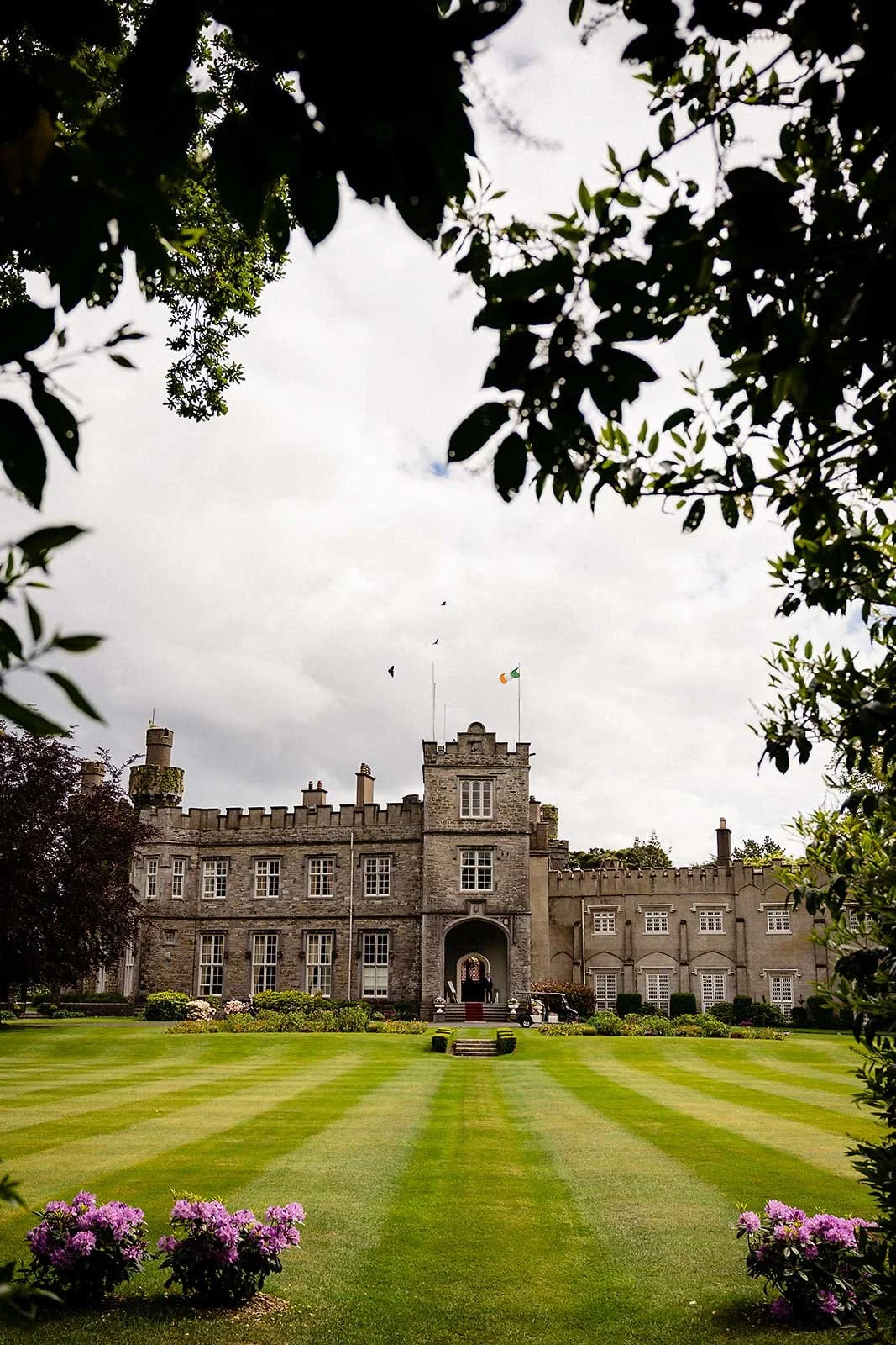 a wedding photograph of The front of luttrelstown castle in dublin