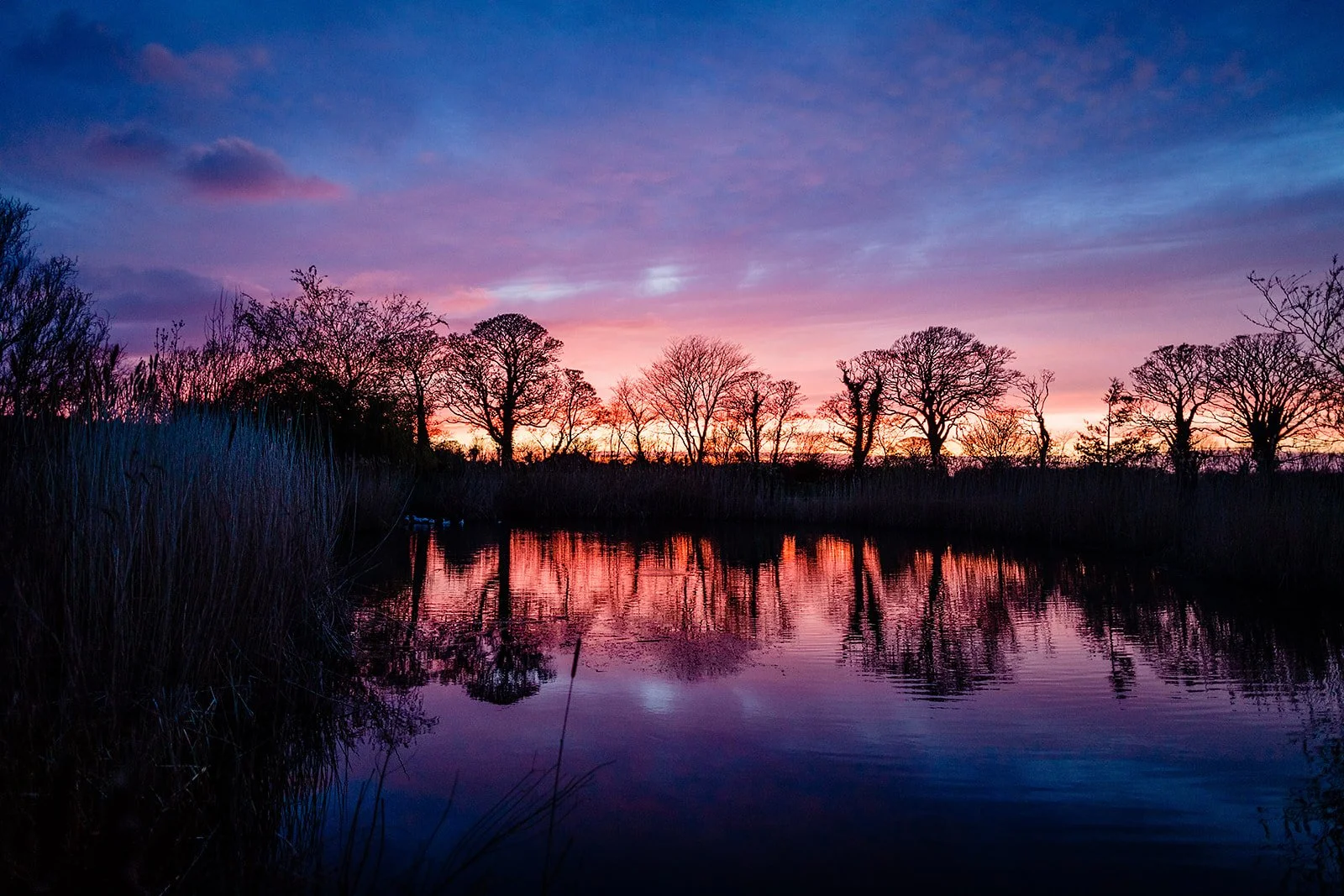 Ballymagarvey lake in sunset wedding photographer kevin kheffache
