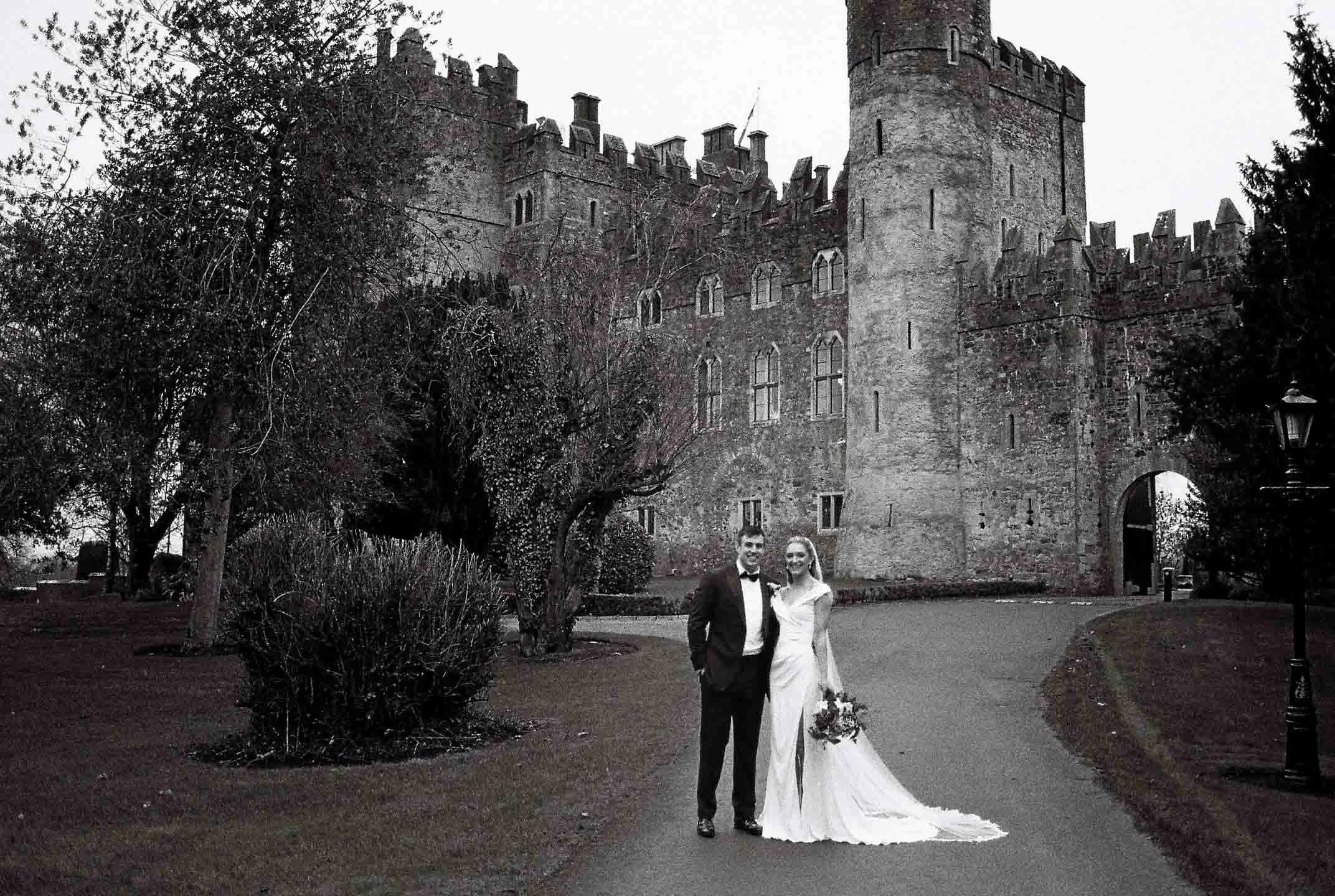 film wedding photography in kilkea castle.couple standing together