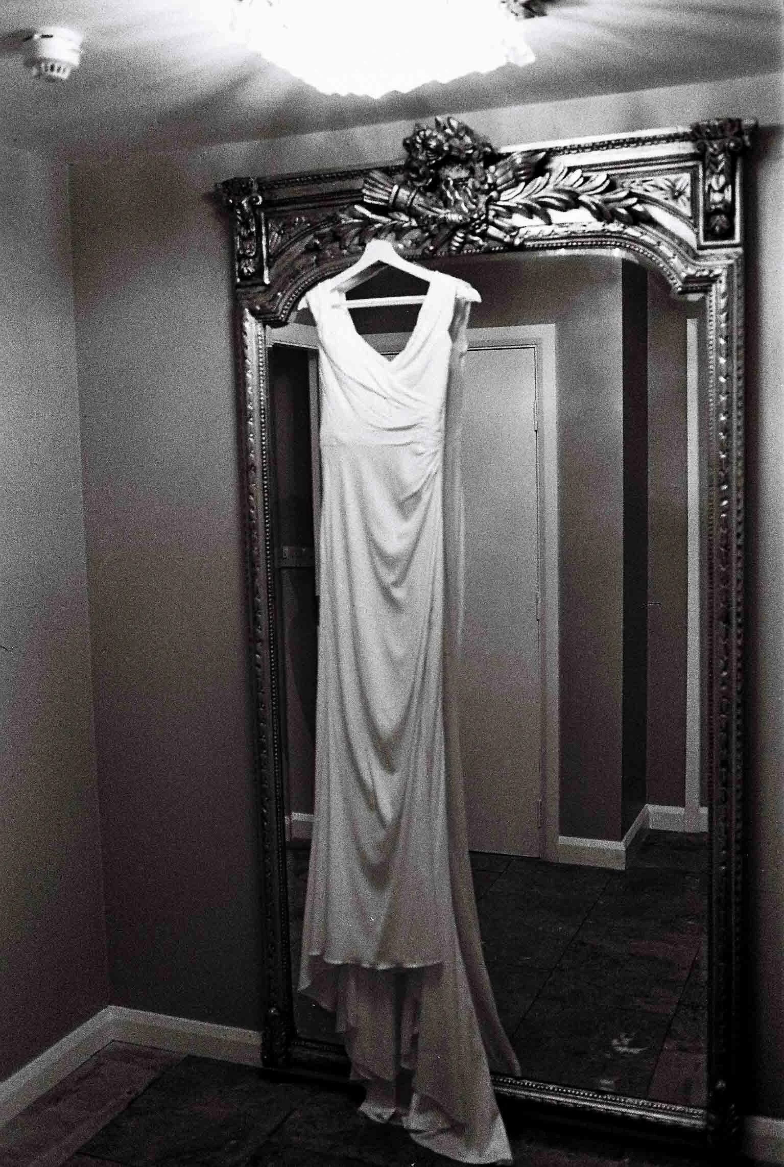 wedding dress hanging on a mirror in kileak castle