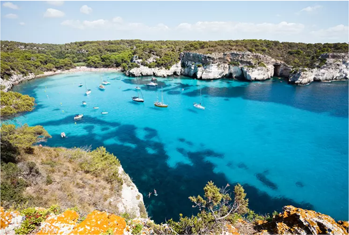 Cala Macarella is one of the hidden delights of Menorca. Image by tagstiles.com - S.Gruene / Shutterstock