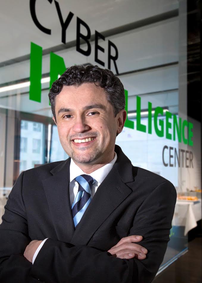 Murat at his favorite spot in the office: The Cyber Intelligence Center! 