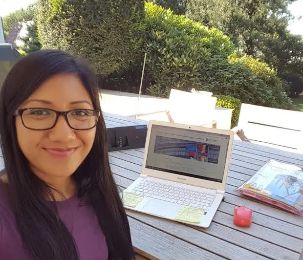 Ikha and her notebook