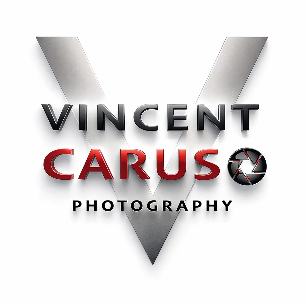 Logo for Vincent Carus Photography featuring a silver V shape, the name Vincent Carus in black and red text, and a camera shutter icon.