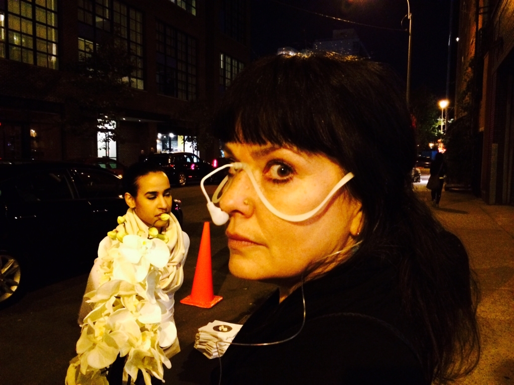 Karina Cousineau of Karina Dresses looking very chic while experiencing non-food. And how about that great idea for a Halloween costume in the background.