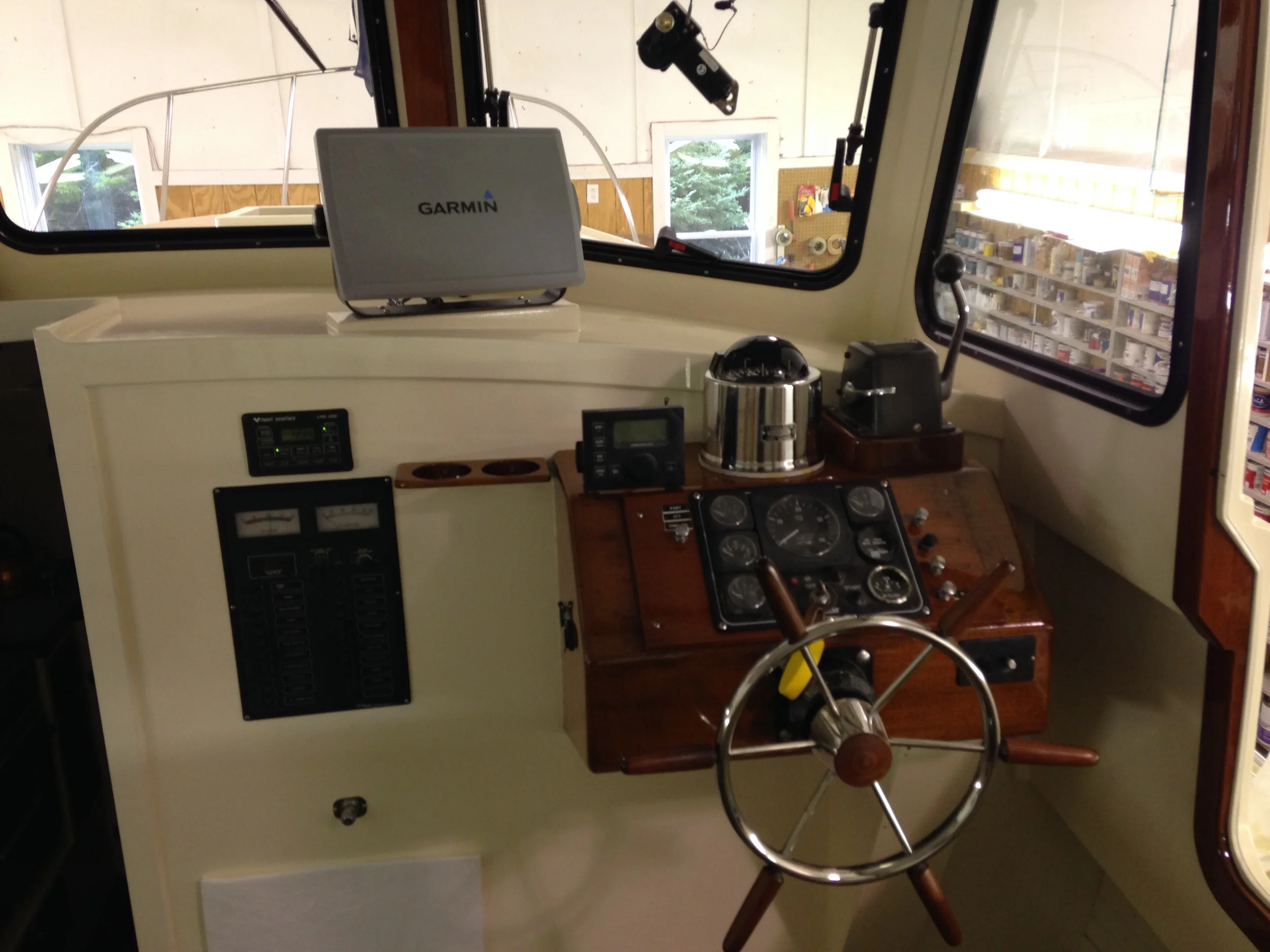  Nice uncluttered helm area with easy access to tend lines through captain's door. 