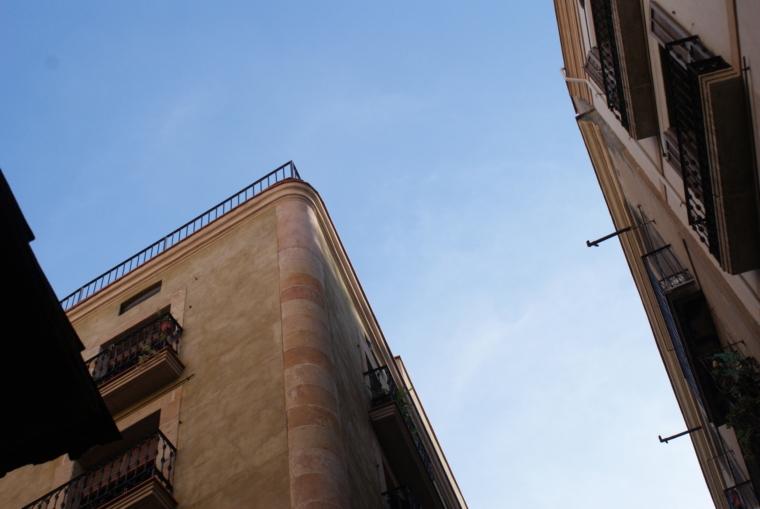 In the darkness of the narrow and winding streets it's necessary to look up at the sky and take in the balconies littered with plants. The shadows lessen and the sun highlights the curves of each terrace. 