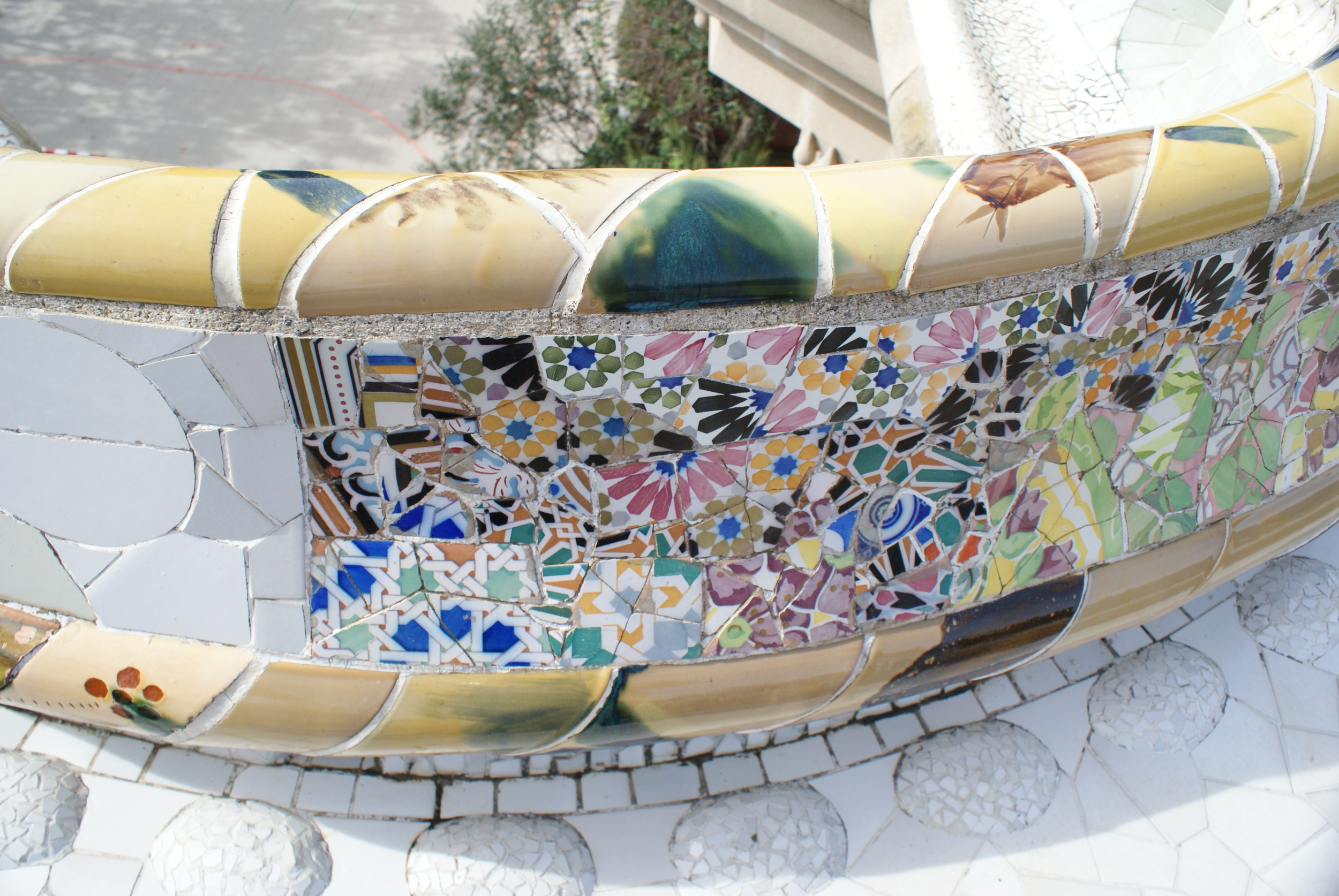 Park Guell boasts some of the most beautiful tiles in all of Spain. With colors and patterns running along the border of the park, you can see where the master Gaudi was headed with his grand mosaic plans for this unfinished community.
