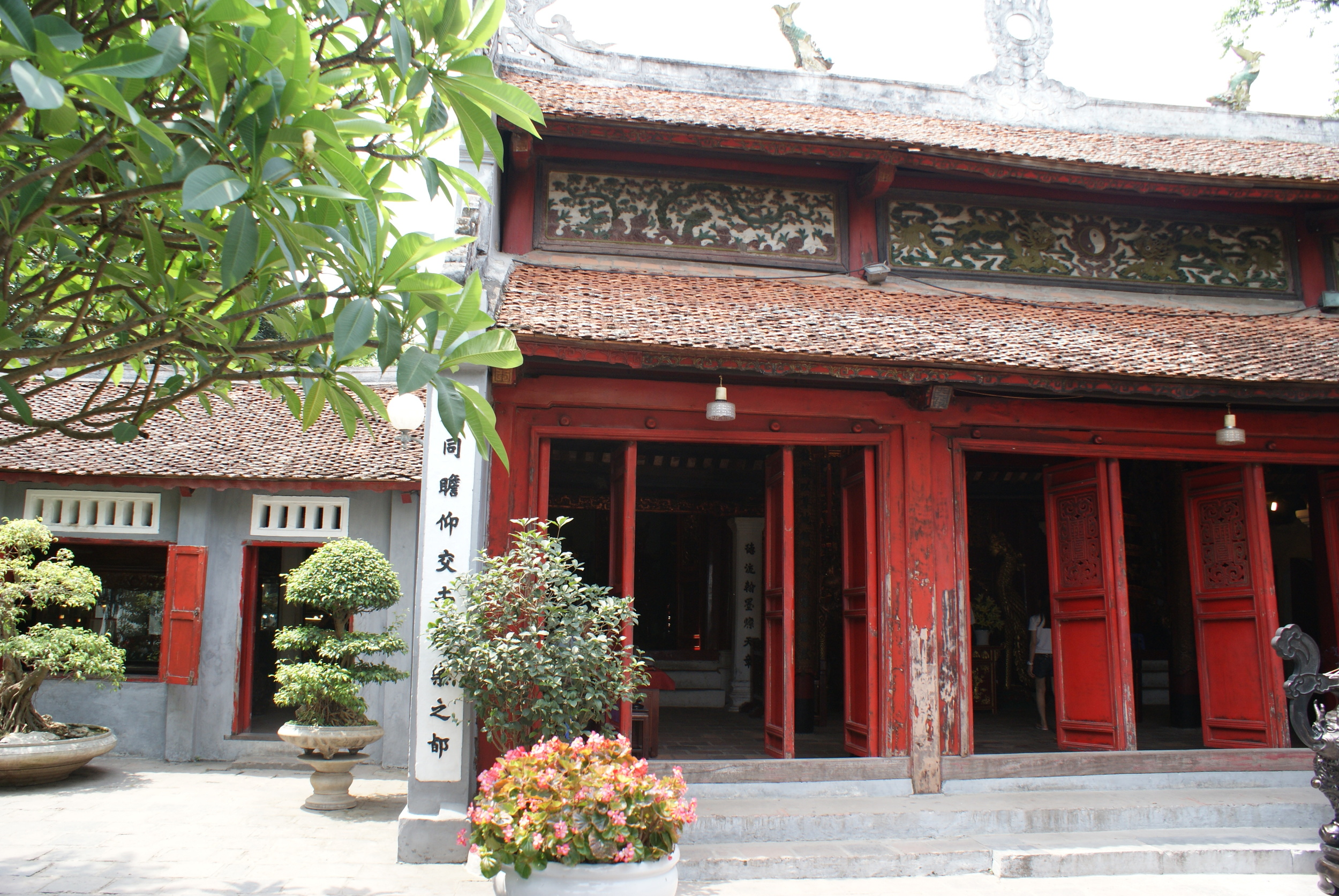 I fell in love with the worn red doors and contrasting white and black lettering. 