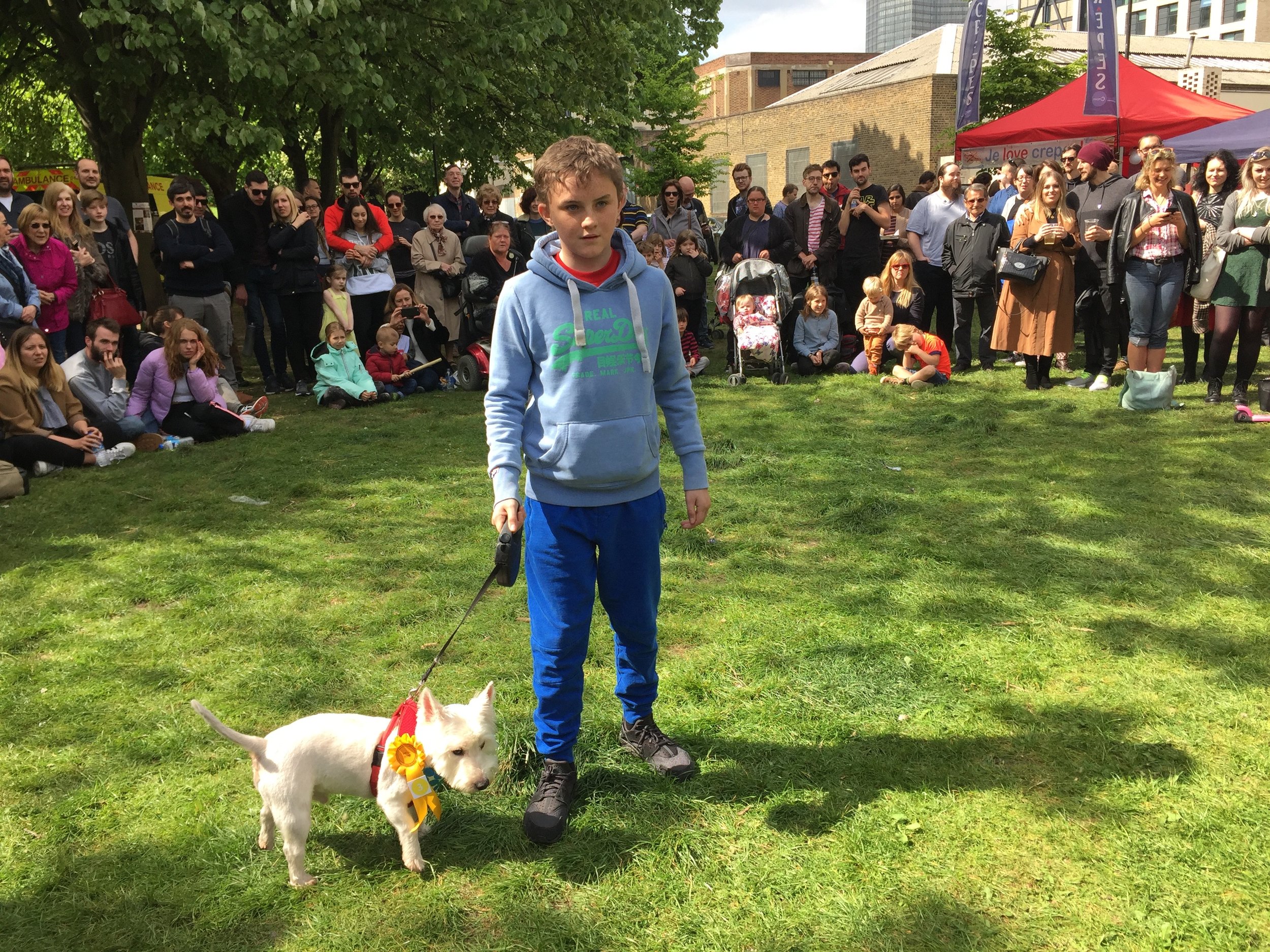 Chuck is being shown by his young handler