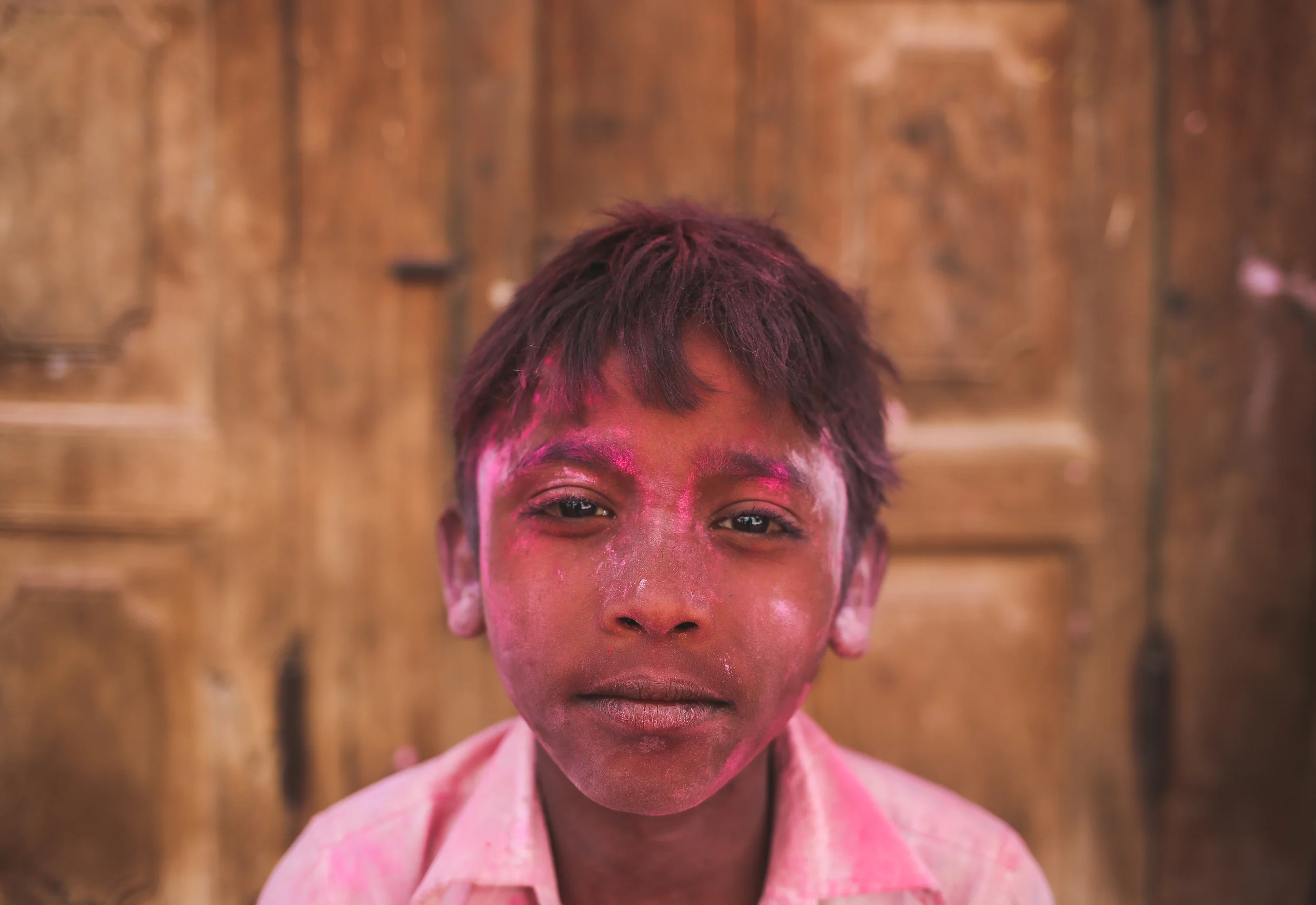 Vrindavan, India - March 23rd, 2016: Portrait of a young boy on the day before Holi. 