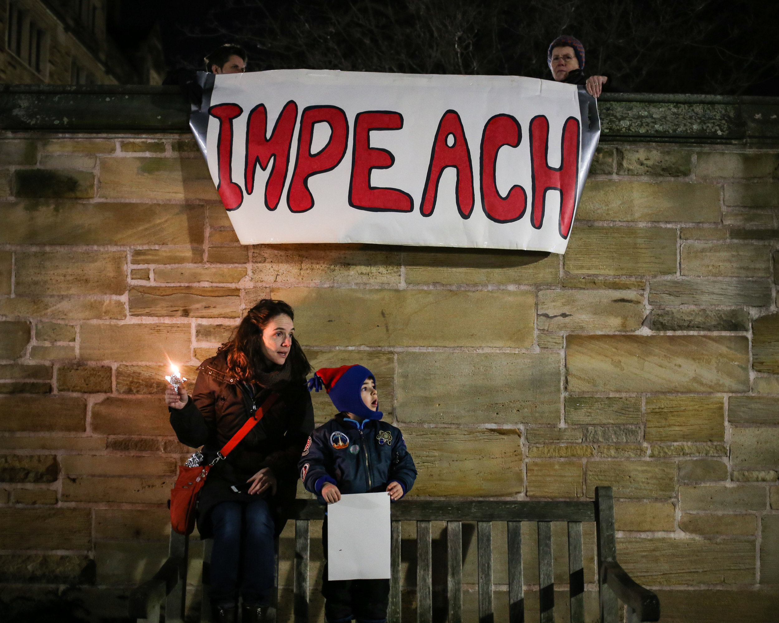 New Haven, Connecticut - January 29th, 2017: A vigil is held for immigrants and refugees following president Trump's executive order to ban specific countries from entering the United States. 