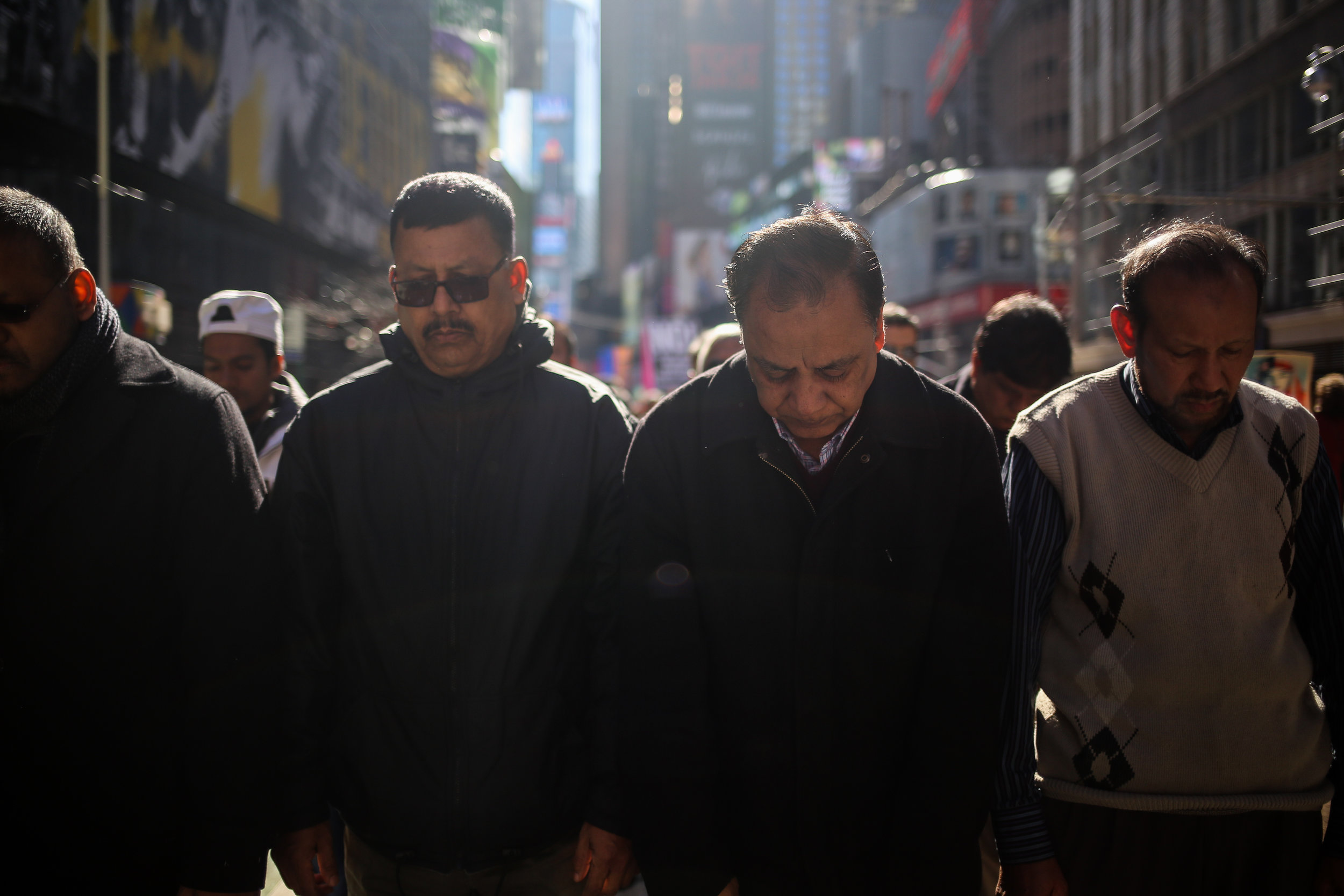  Men share afternoon prayer in Times Square during the I Am A Muslim Too rally // February 19th, 2017 // New York City. 