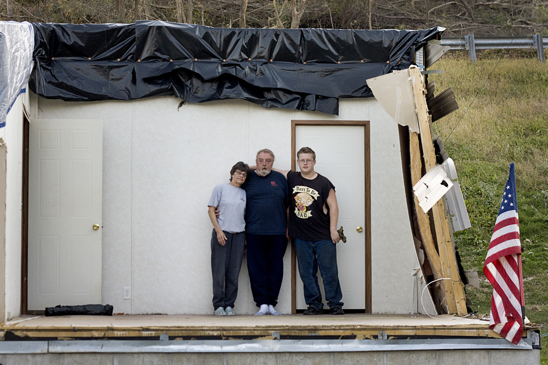 Marilyn and Garry Weddington stand in their bedroom with their son, Michael on October 10.