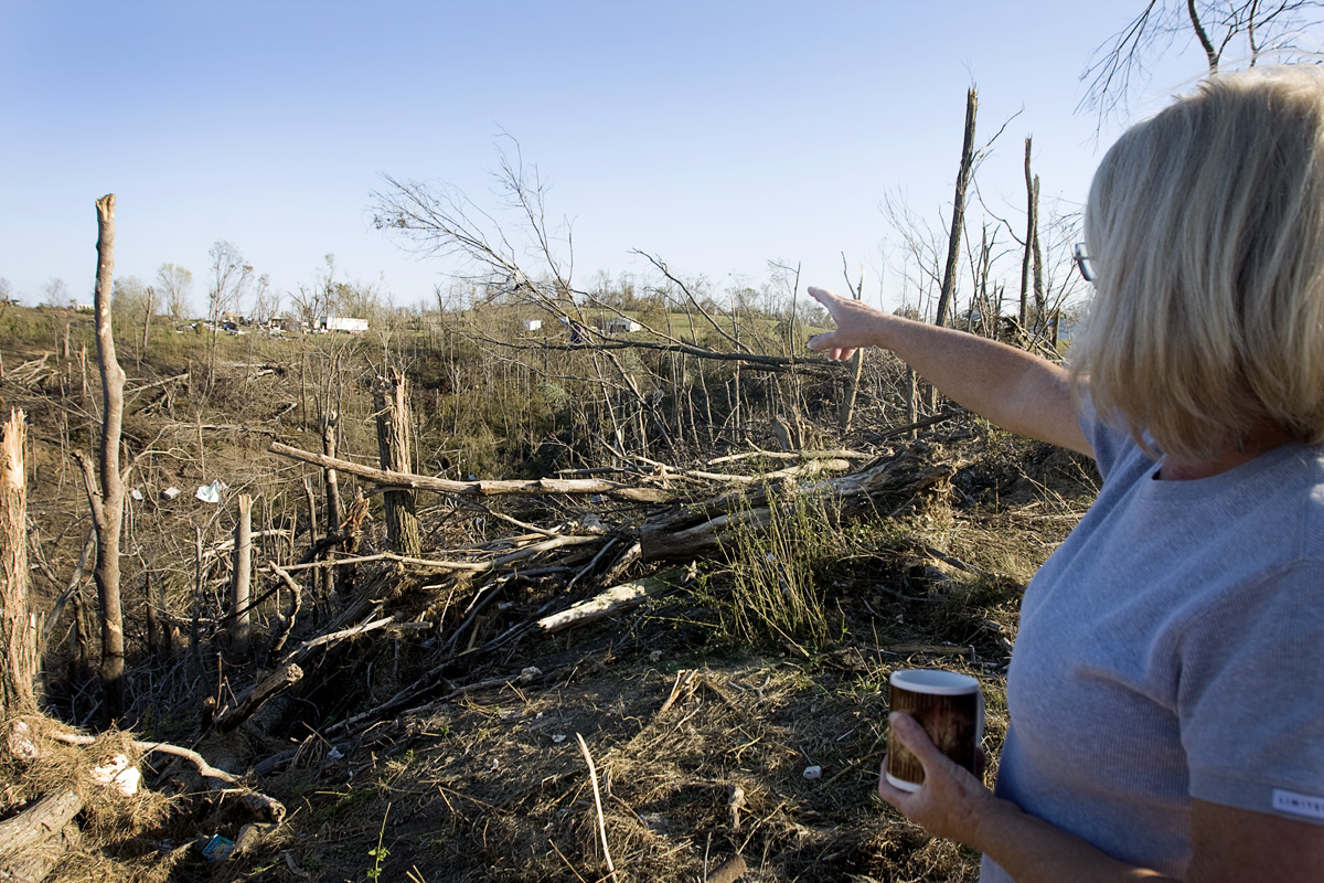 Shirley looks out at the destruction from the tornado.