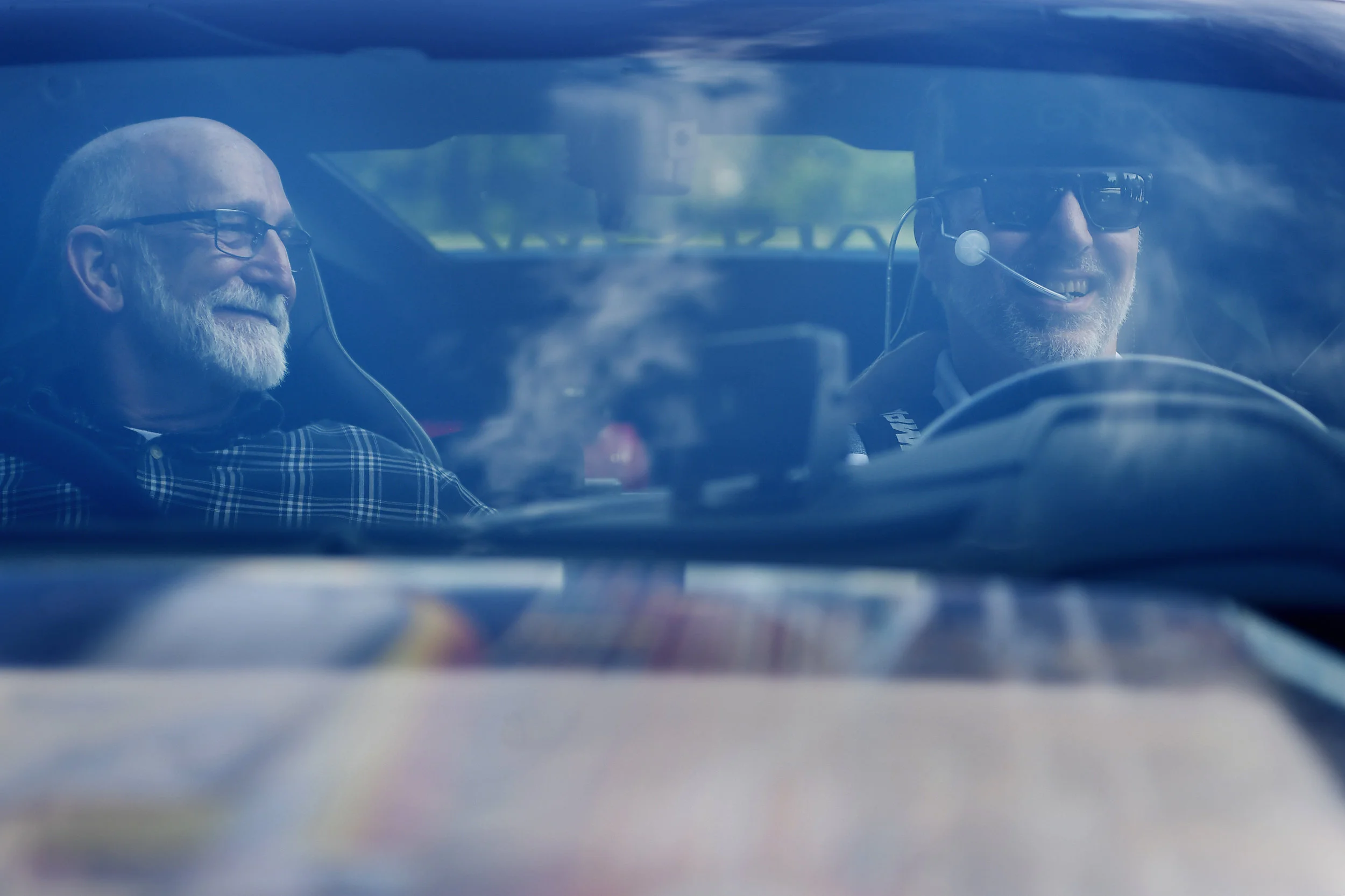  Charlie Layman, left, smiles at his partner, Paul Endry, as they sit in the Arrow Electronics Semi-Autonomous Motorcar a vacant Sears lot Tuesday, August 7, 2018. Endry, an Asheville optometrist, was given the opportunity to drive again after he was