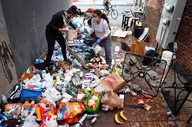The alleyway to One World Brewing is left in disarray after Asheville Police tipped over tables of food and medical supplies at what organizers say was a city approved medical station June 2, 2020. At least one protester needed stitches in the night 