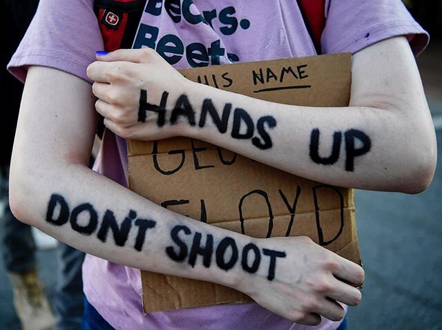 A fan of the television show, The Office, stands in the middle of Biltmore Ave June 1, 2020, while protesting in Asheville, North Carolina. 📷 @angwilhelm .
.
.
.
.
#bearsbeetsbattlestargalactica #handsupdontshoot #theoffice #avl #asheville #ashevill