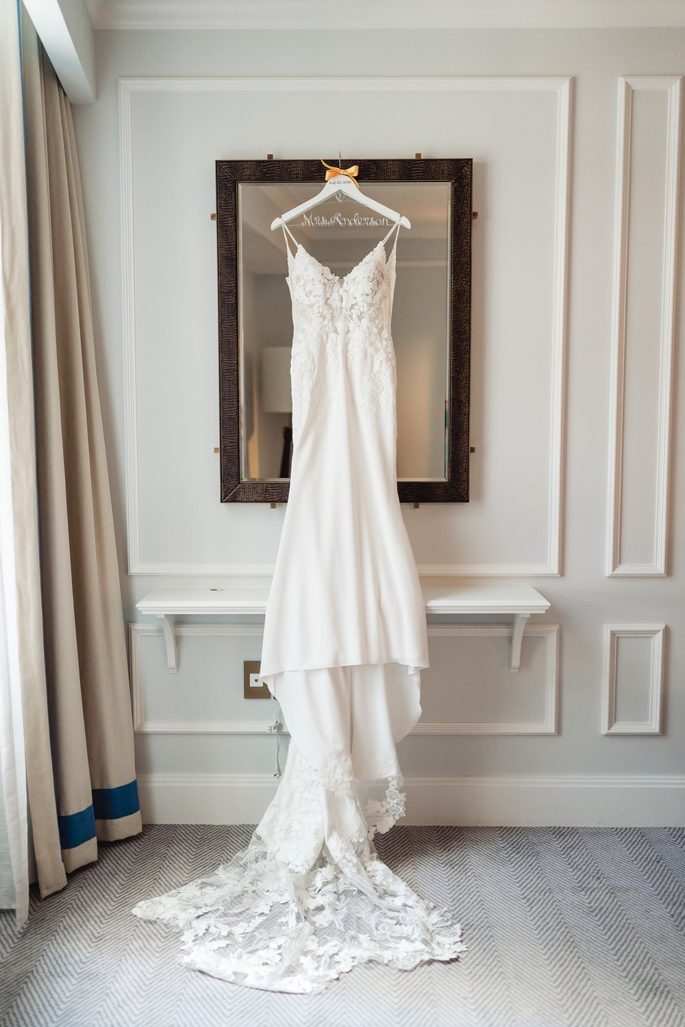 hanging wedding dress at Langham hotel