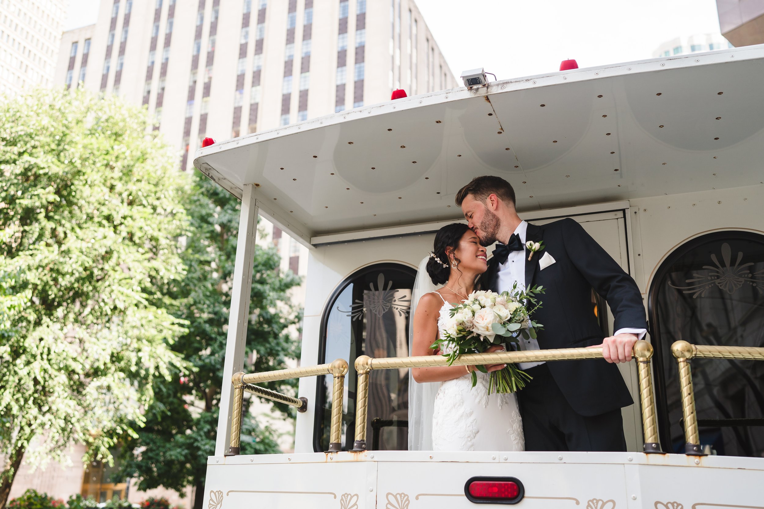 wedding portrait on back of trolley in boston