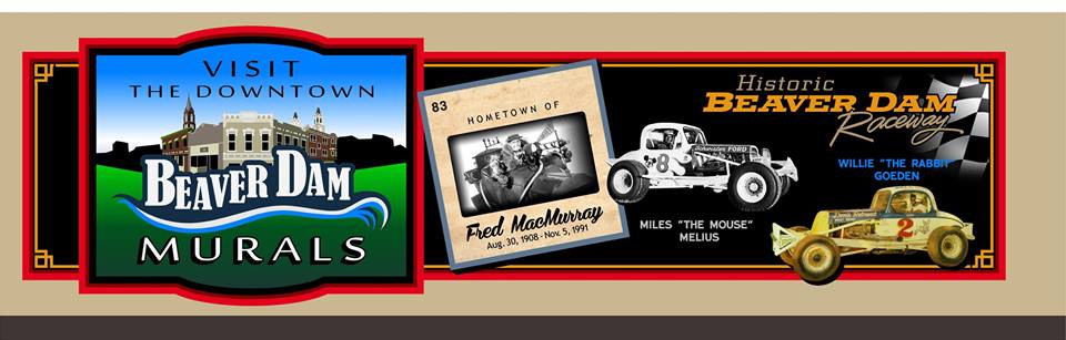 12. Project Leader: Kurt Gaber, Chippewa Falls Wisconsin Subject: Welcome to Beaver Dam/Vintage Cars and Racing Champion: Countryside Automotive Group Location: Cigelske Transmissions Building, Al and Judy Beyer, Chevron The left side of the mural welcomes visitors to Beaver Dam. To its right is Fred MacMurray in the flying car he invented for the Disney film, The Absent-Minded Professor . His mother was descended from one of Beaver Dam’s founding fathers and considered a great beauty. MacMurray became a leading man in Hollywood starring in films such as Double Indemnity, The Caine Mutiny , Flubber and The Shaggy Dog . Speedway Race Park is remembered for three racers: Miles Melius (the mouse) Fuzzy Fassbender (the hound) and Billy Johnson (the cat). They made a name for themselves by starting at the back of the pack, with one of them always ending as the winner.