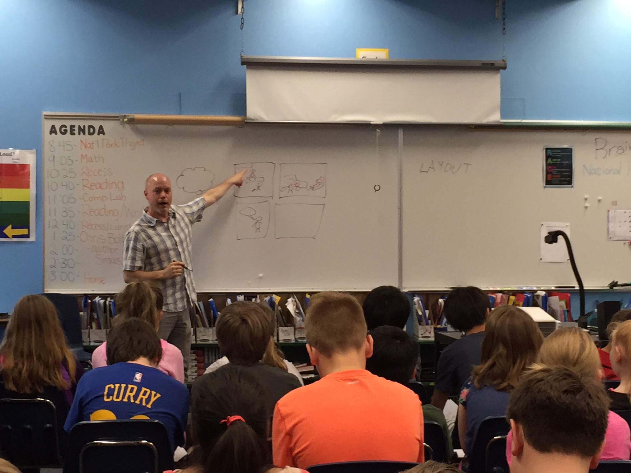 Chris shows the kids how to thumbnail a comic page.
