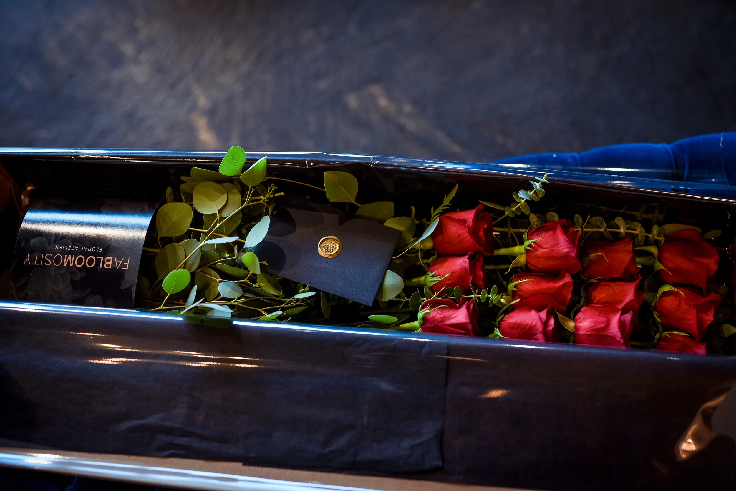 Fabloomosity Classic Rose Box featuring red roses and fresh greenery, luxury Valentine’s flower delivery Edmonton AB