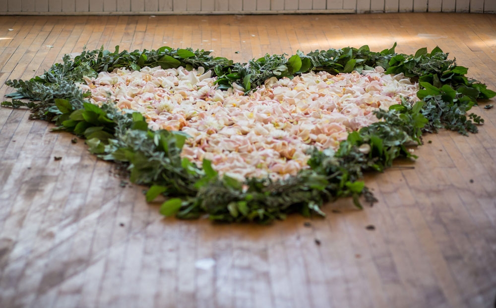 A Heart-Shaped Bed of Rose Petals for Ceremony