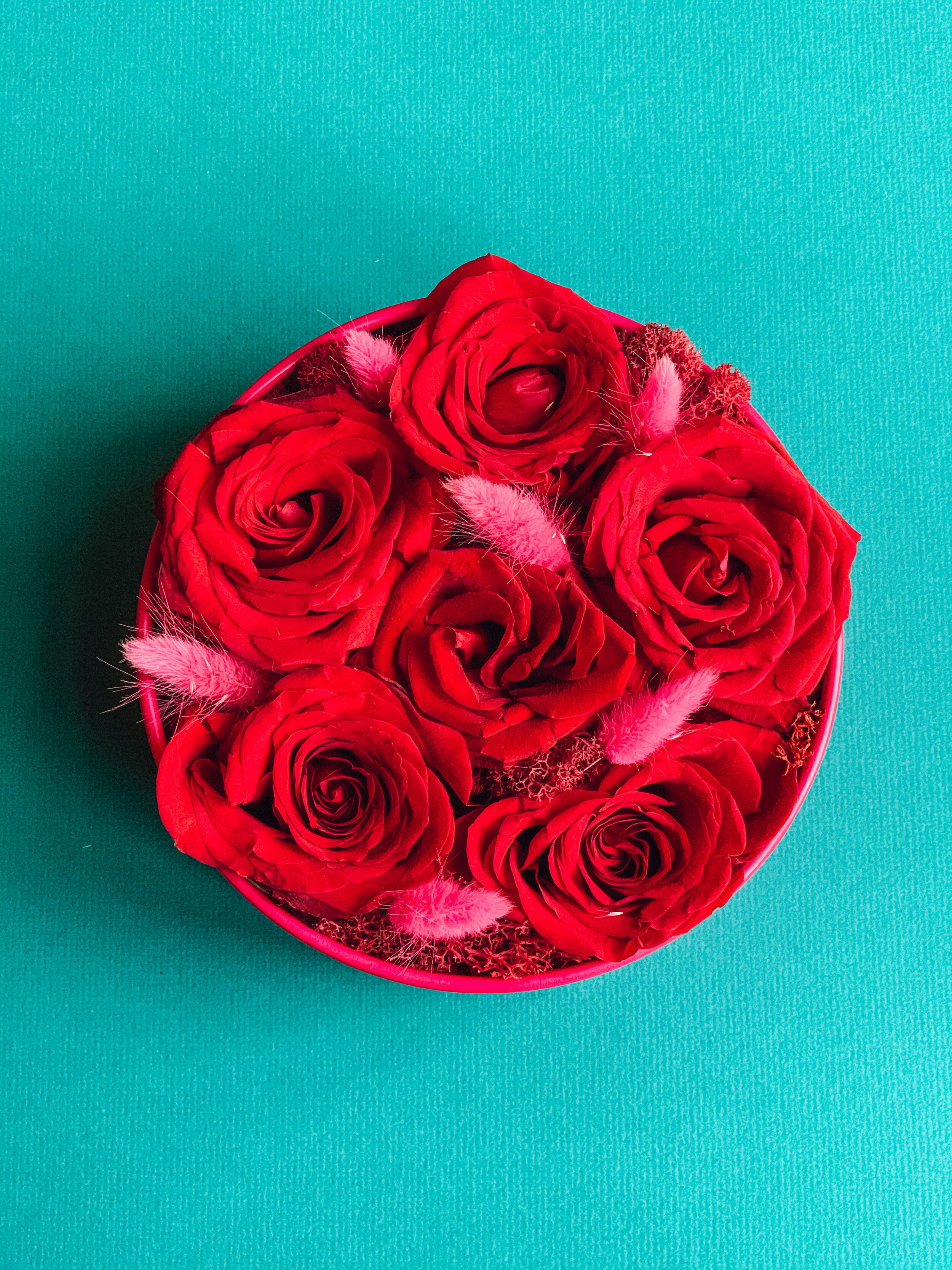Red rose arrangement in a black hat box for Valentine’s Day, available for delivery in Edmonton, St. Albert and surrounding areas.