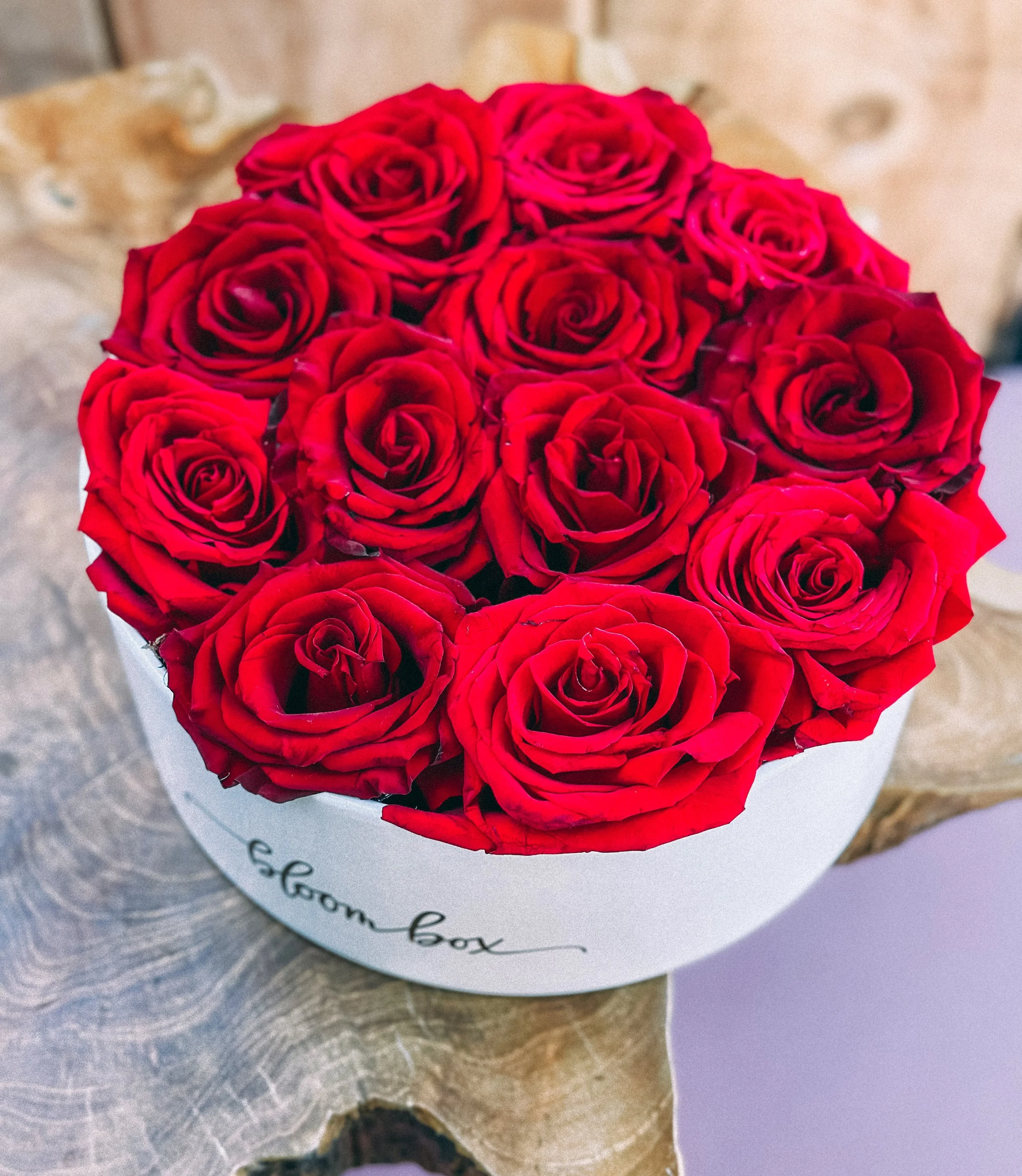 Red rose heart box arrangement in a white hat box for Valentine’s Day, available for delivery, Edmonton, St. Albert and surrounding areas.