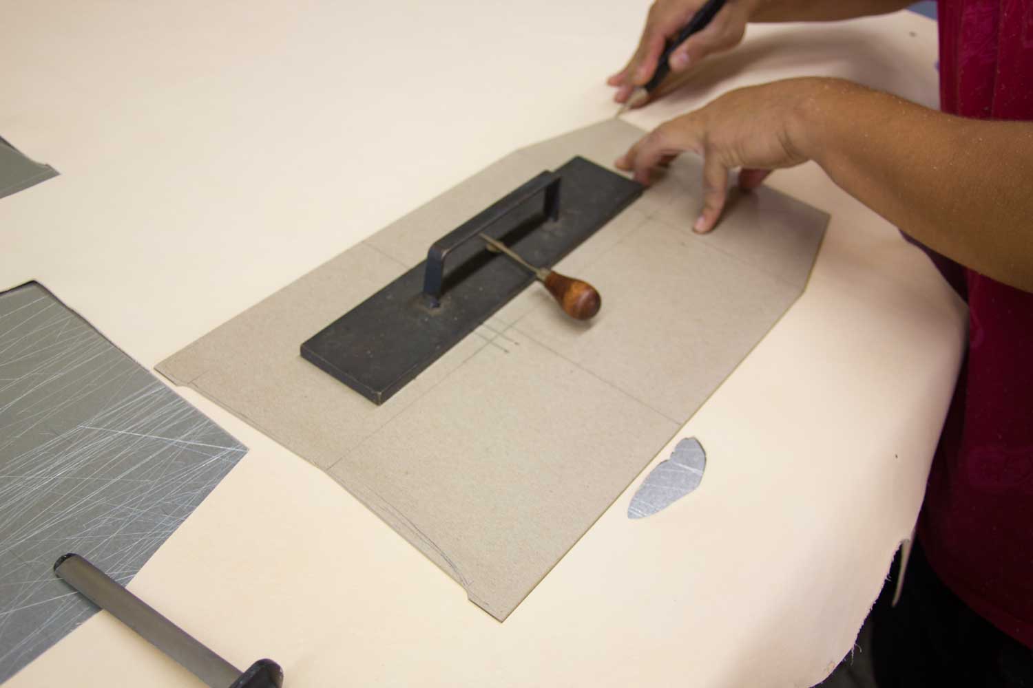 Hand cutting the envelope
