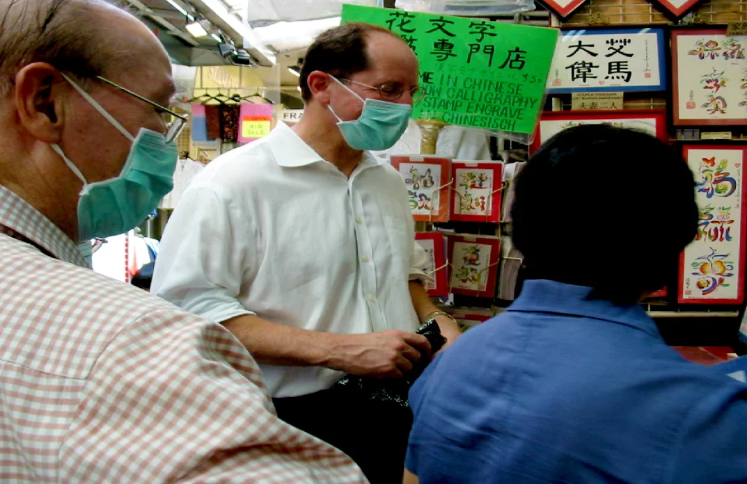 Dr. Daniel Lucey wears a mask in Hong Kong during the SARS outbreak in May 2003.